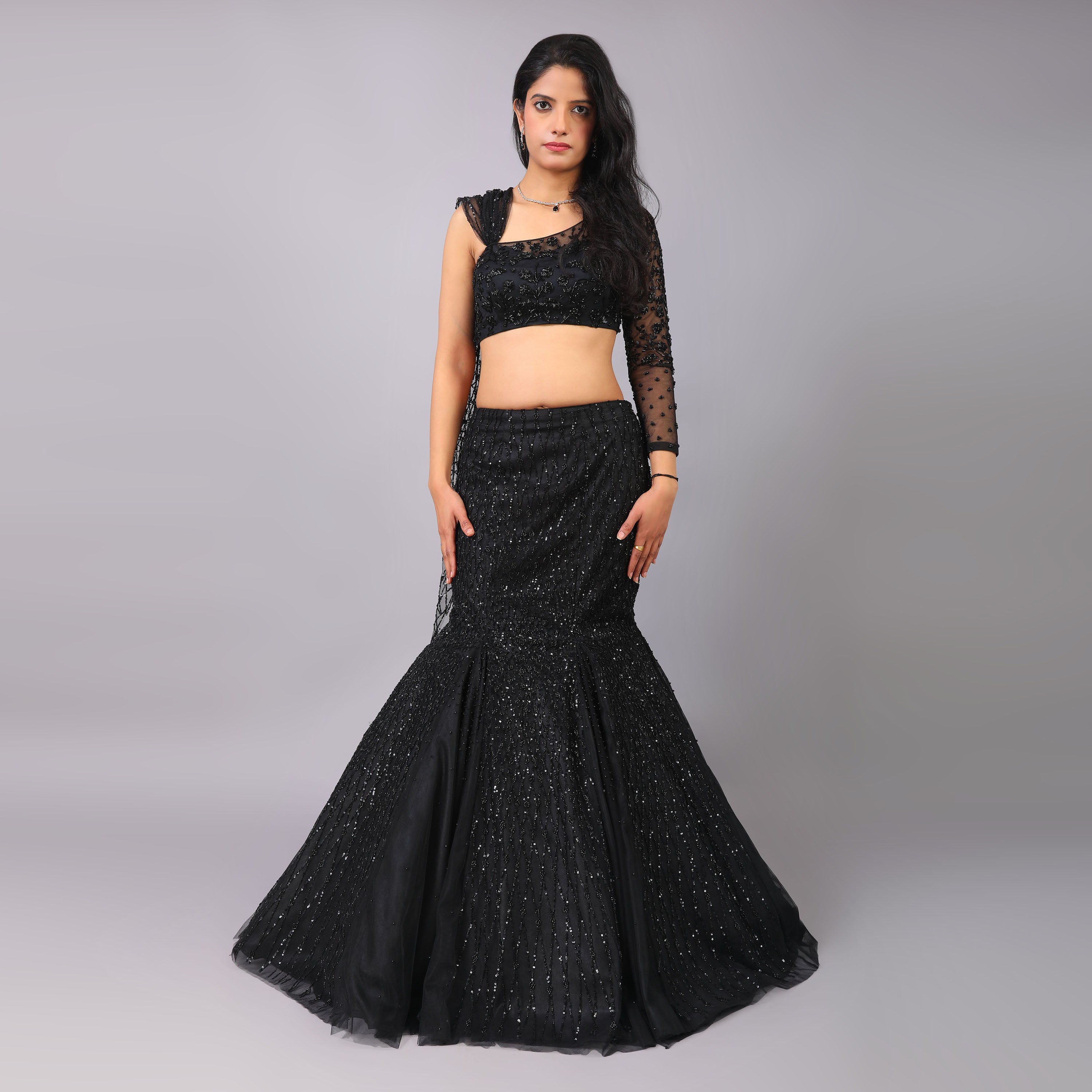 Black Fish-cut godet style flared hand emboridered lehenga with one sleeve hand embroidered blouse and dupatta attached with it. - qivii