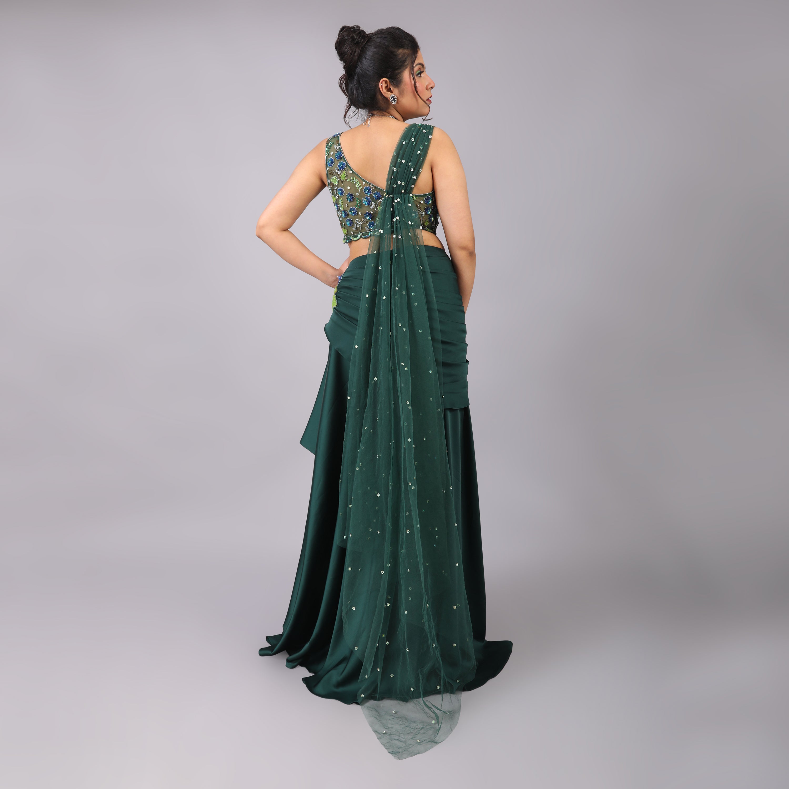 Emerald Green Asymmetrical drape skirt with hand embroidered blouse of one shoulder with attached long dupatta on the other side - qivii