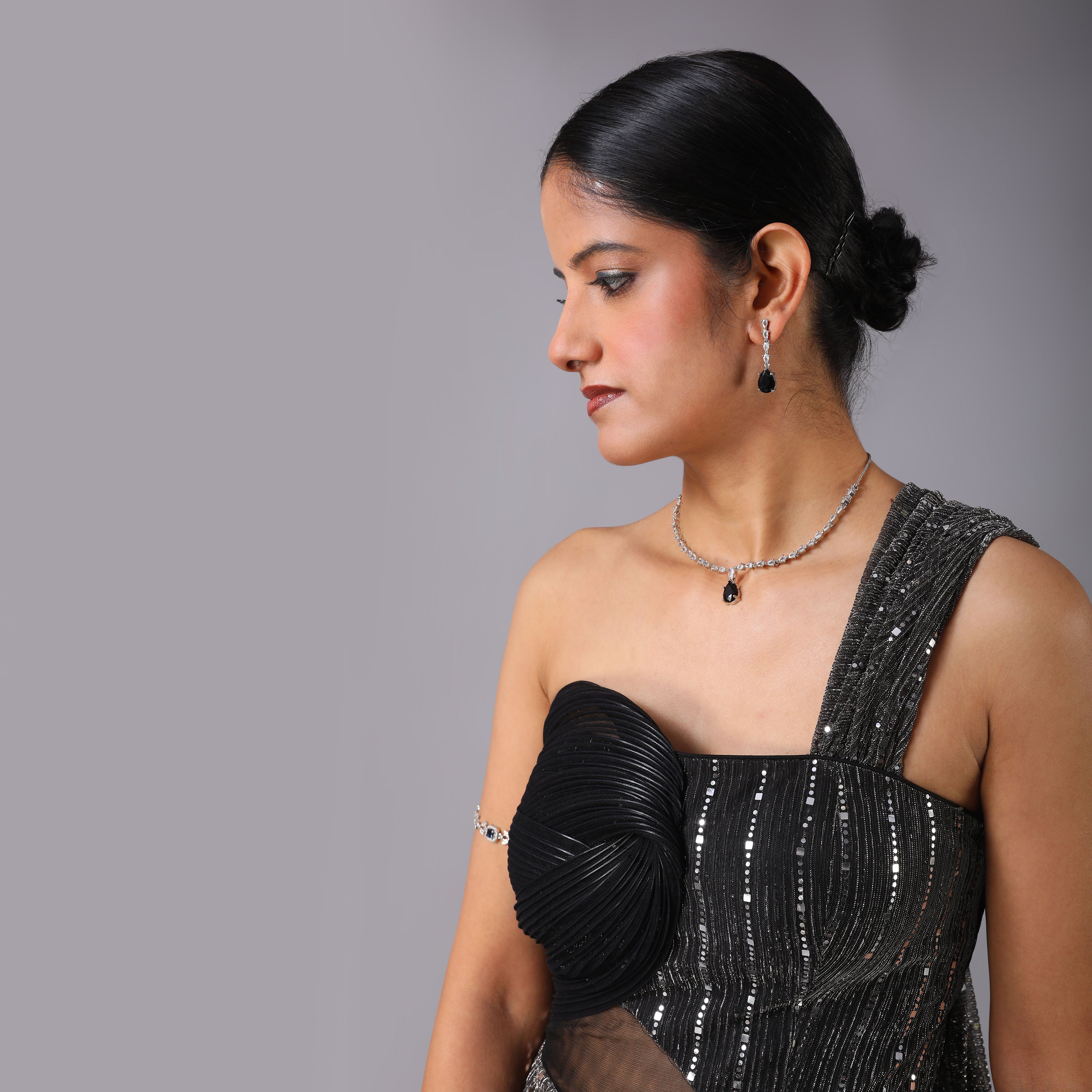 One-Shoulder Glam Metallic grey Sequin pre-draped Saree gown with asymmentrical geomatrical shape - qivii