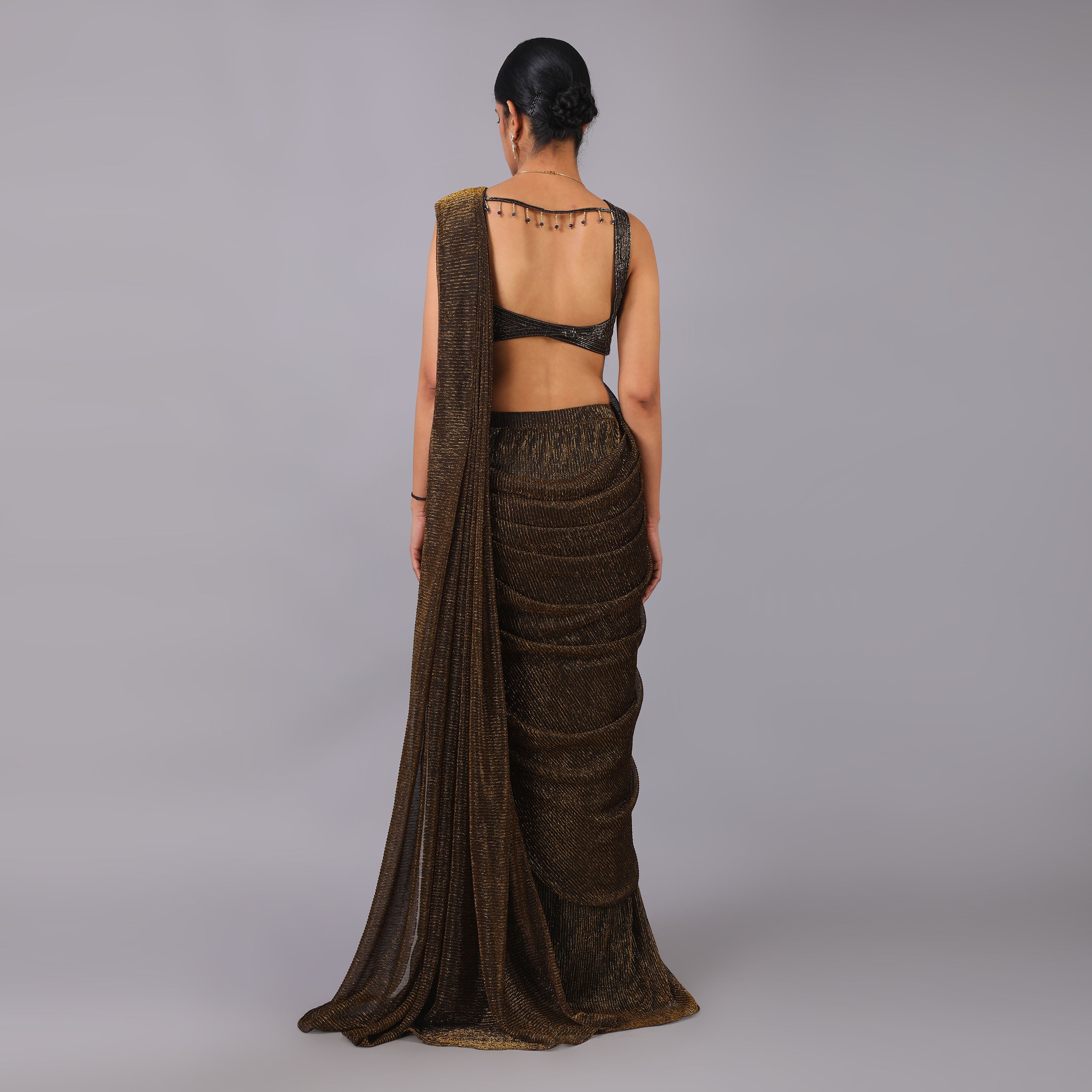 Shimmering Bronze Metallic Pre-draped Saree with geomatrical pattern hand embroidered blouse - qivii