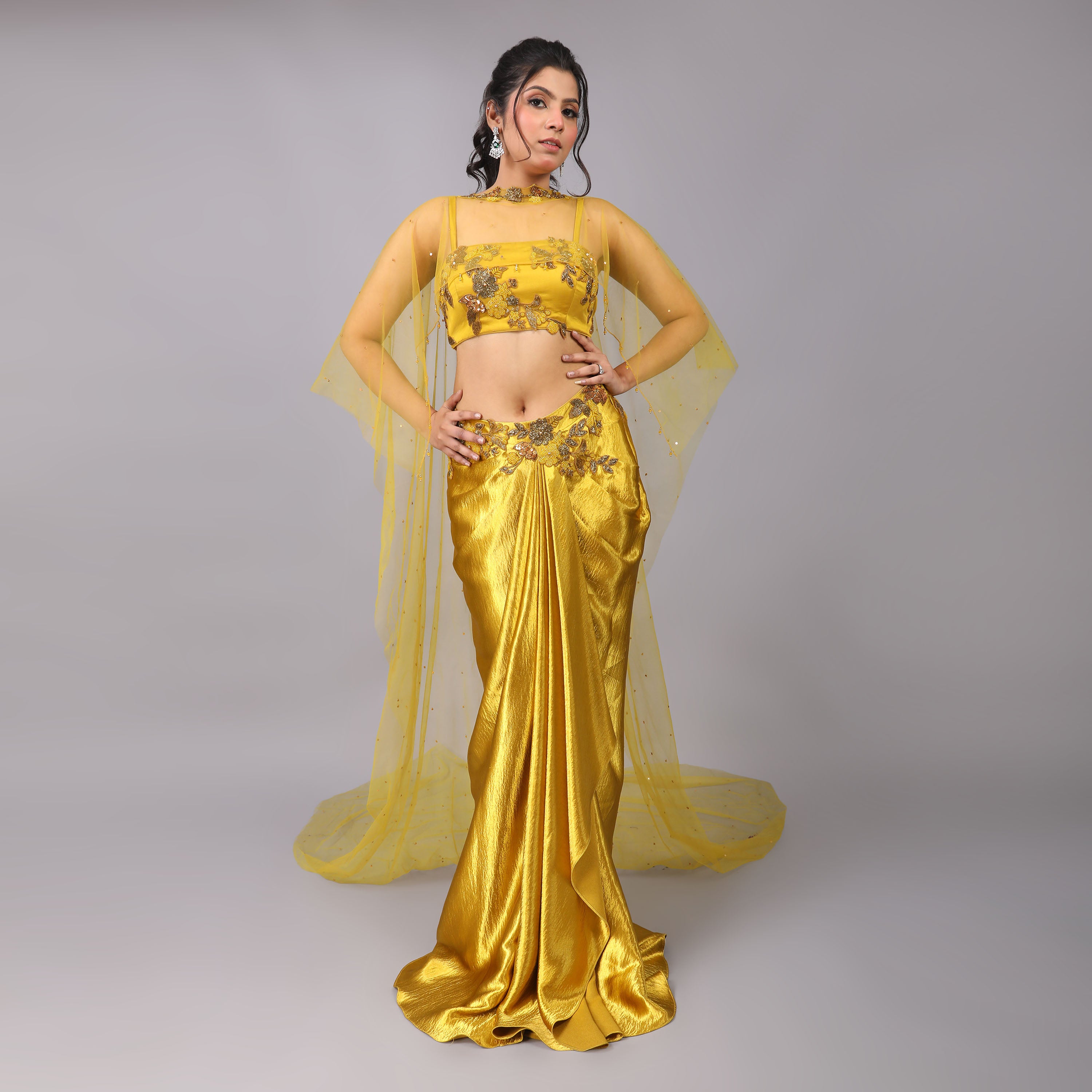 Golden Drape skirt and blouse with attached floral embellishments and Sheer trailed Cape adds glamour to this dress - qivii