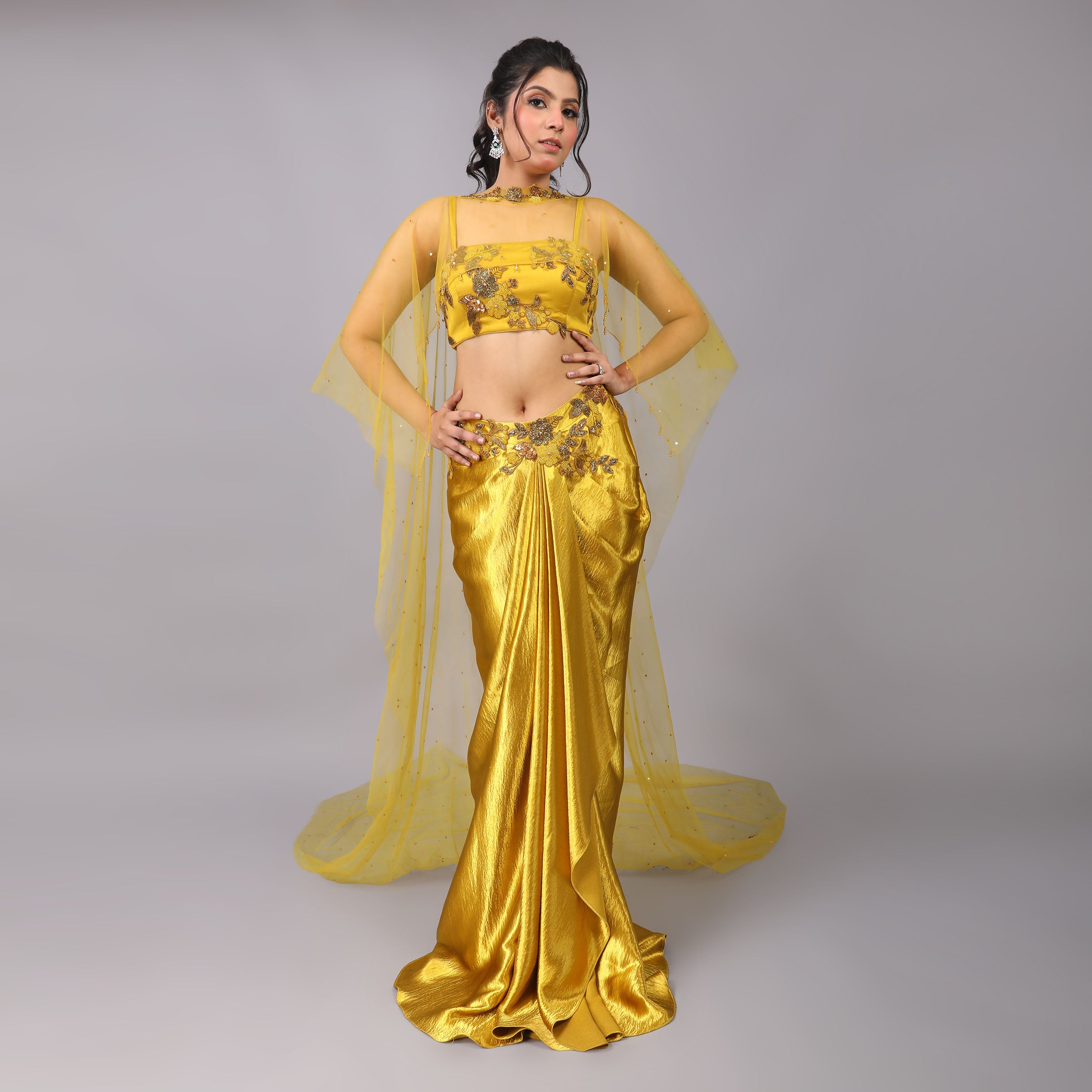 Golden Drape skirt and blouse with attached floral embellishments and Sheer trailed Cape adds glamour to this dress - qivii