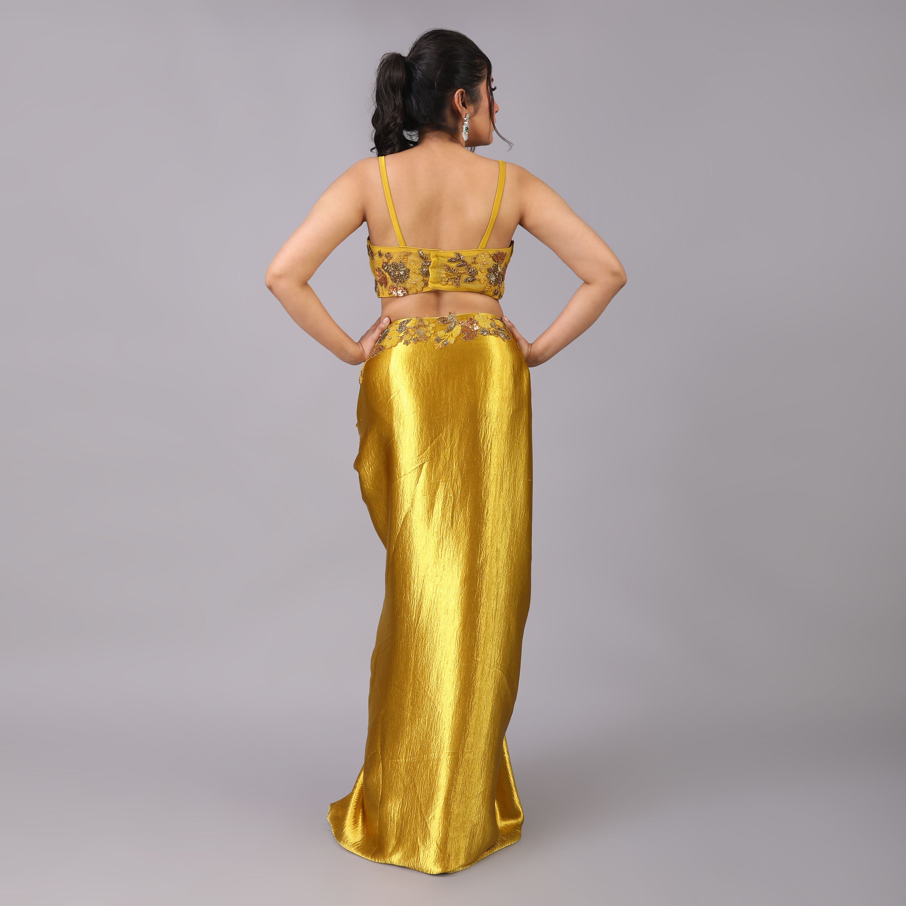 Golden Drape skirt and blouse with attached floral embellishments and Sheer trailed Cape adds glamour to this dress - qivii