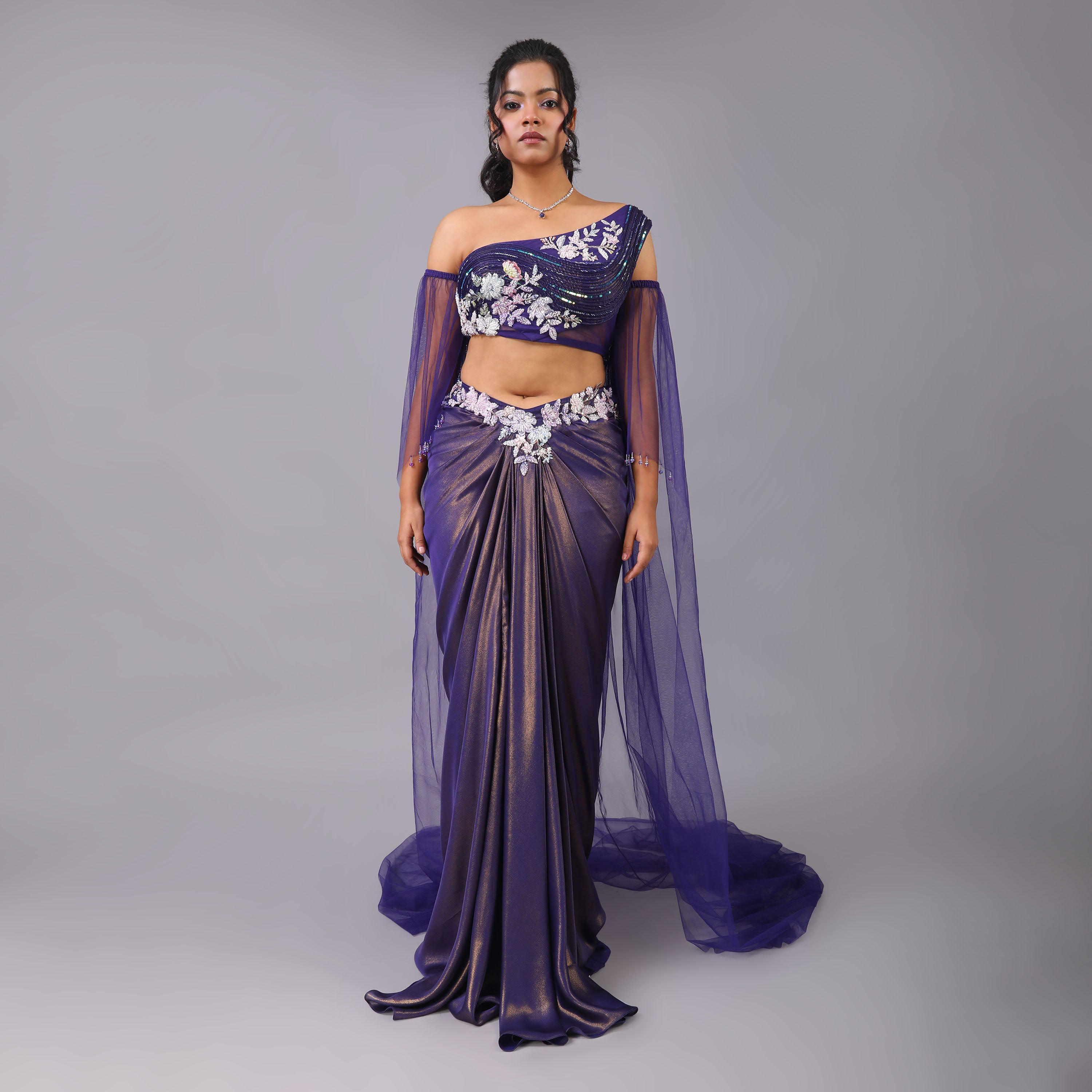 Shimmering Purple draped skirt and one shoulder sculpted blouse with sheer trailed cape - qivii