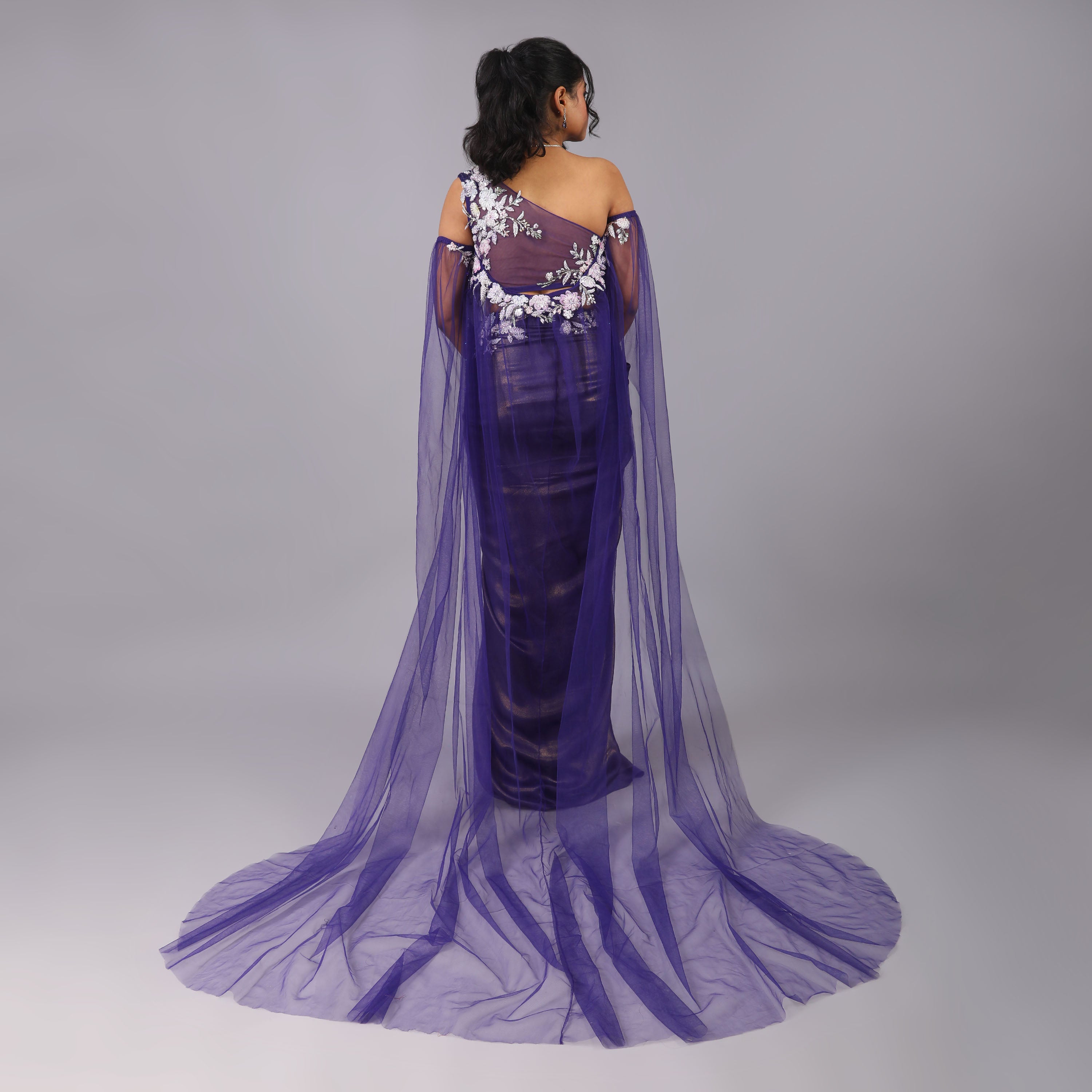 Shimmering Purple draped skirt and one shoulder sculpted blouse with sheer trailed cape - qivii