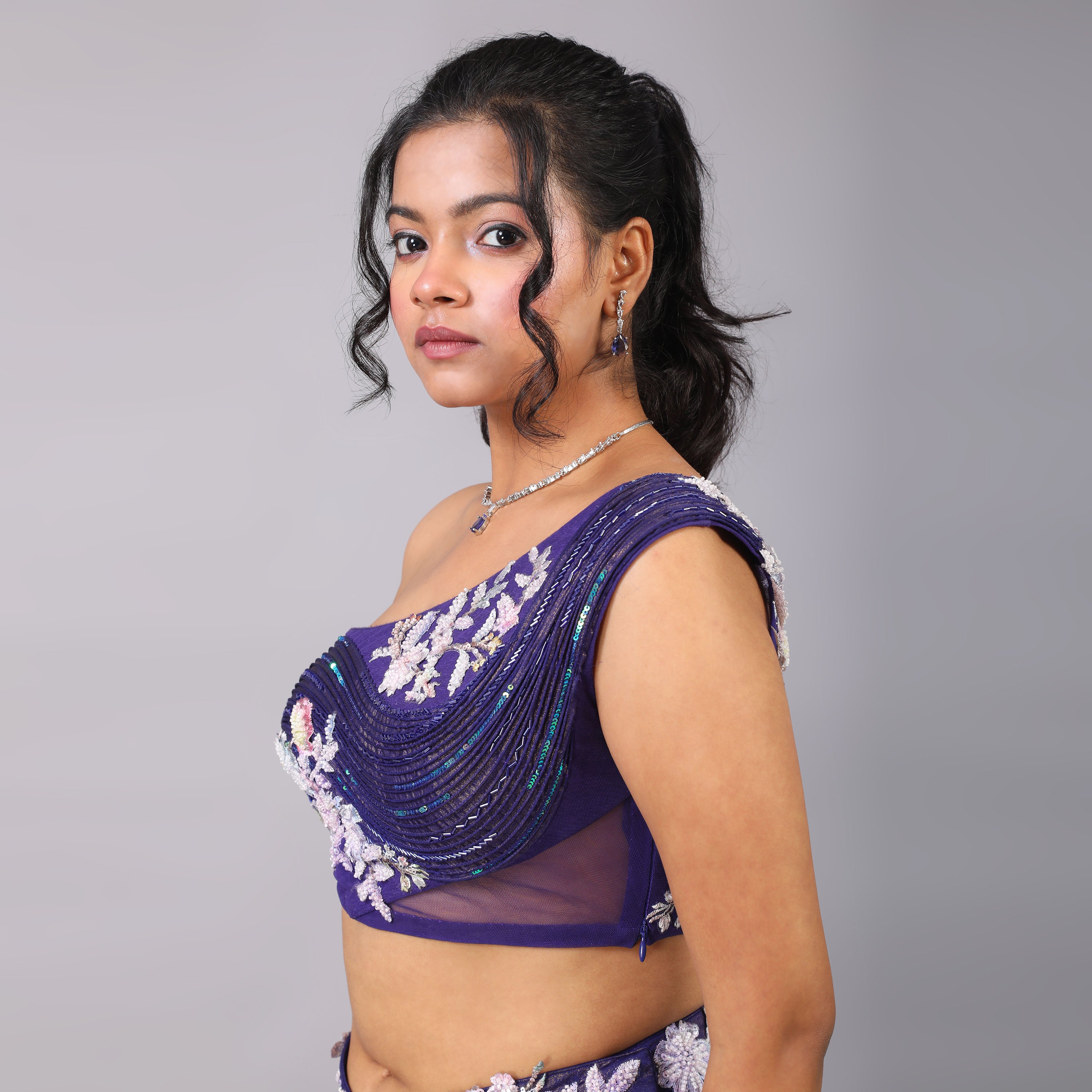 Shimmering Purple draped skirt and one shoulder sculpted blouse with sheer trailed cape - qivii