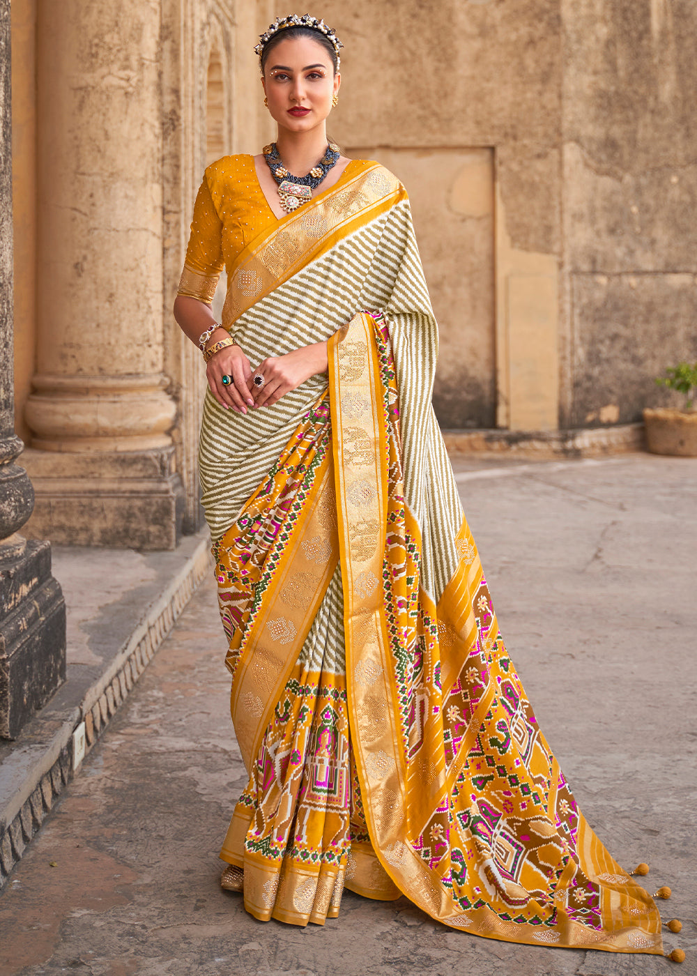 Saffron Yellow Designer Patola Silk Saree with Zari Border & Stone work(Pre-Order) - qivii