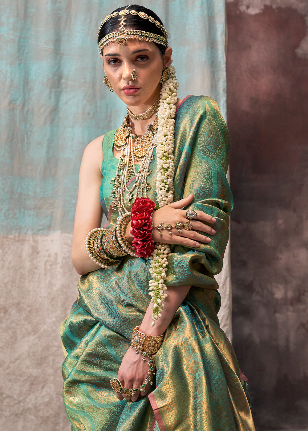 Pastel Green Two Tone Kanjivaram Silk Saree Embellished with Intricate Gold Zari work : Top Pick - qivii