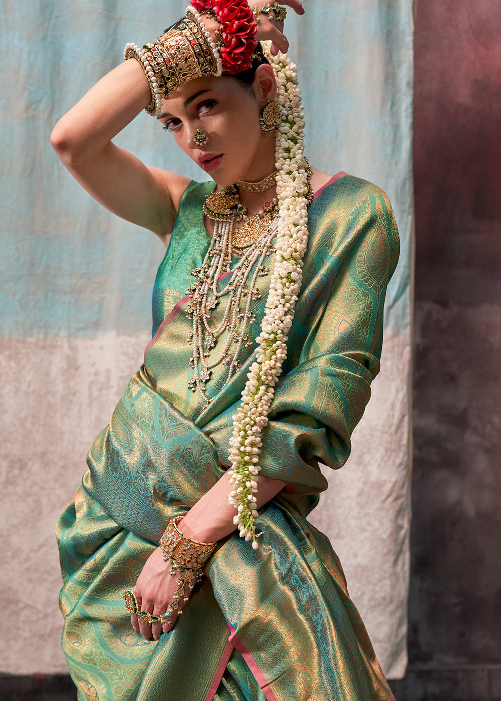 Pastel Green Two Tone Kanjivaram Silk Saree Embellished with Intricate Gold Zari work : Top Pick - qivii