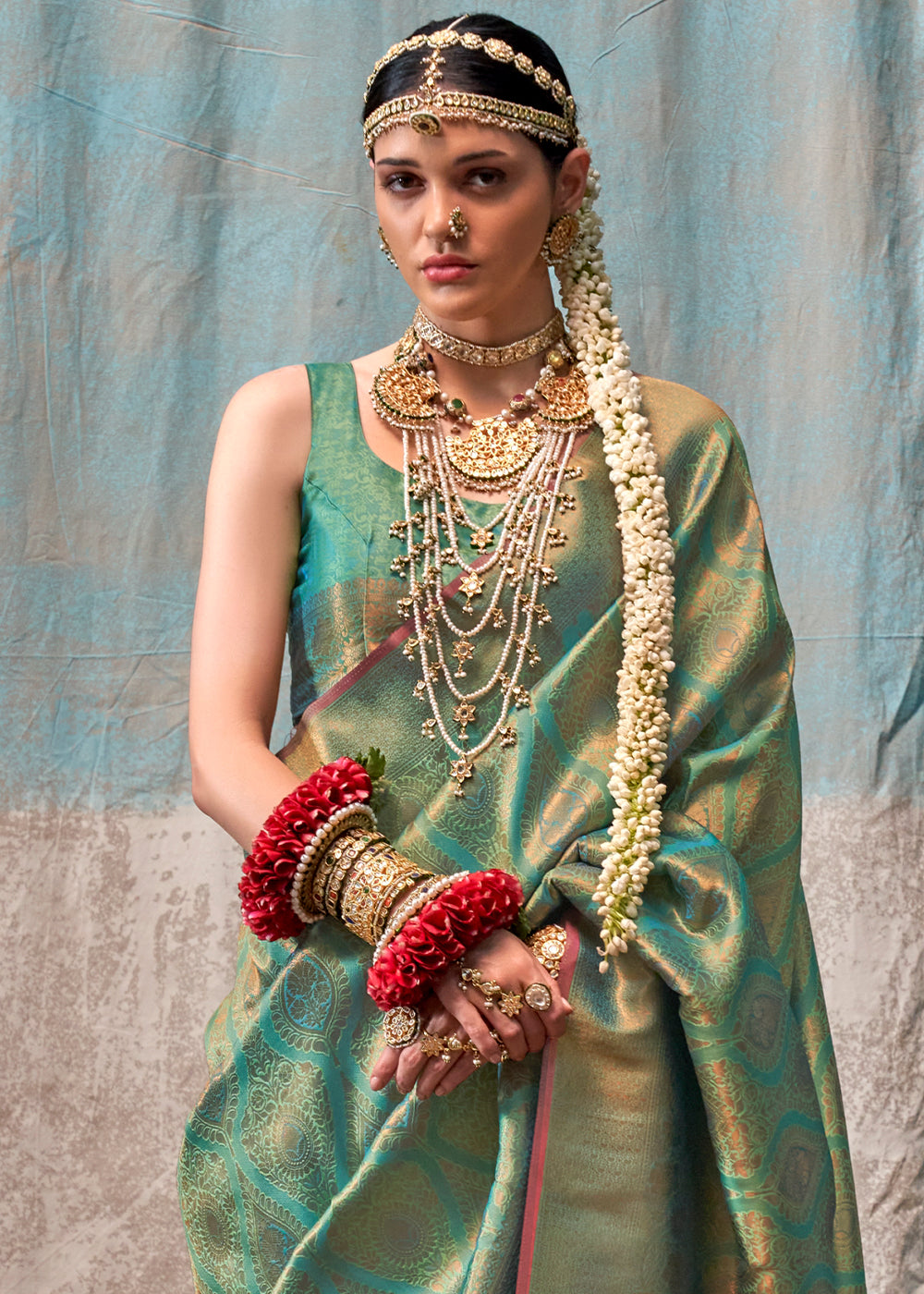 Pastel Green Two Tone Kanjivaram Silk Saree Embellished with Intricate Gold Zari work : Top Pick - qivii