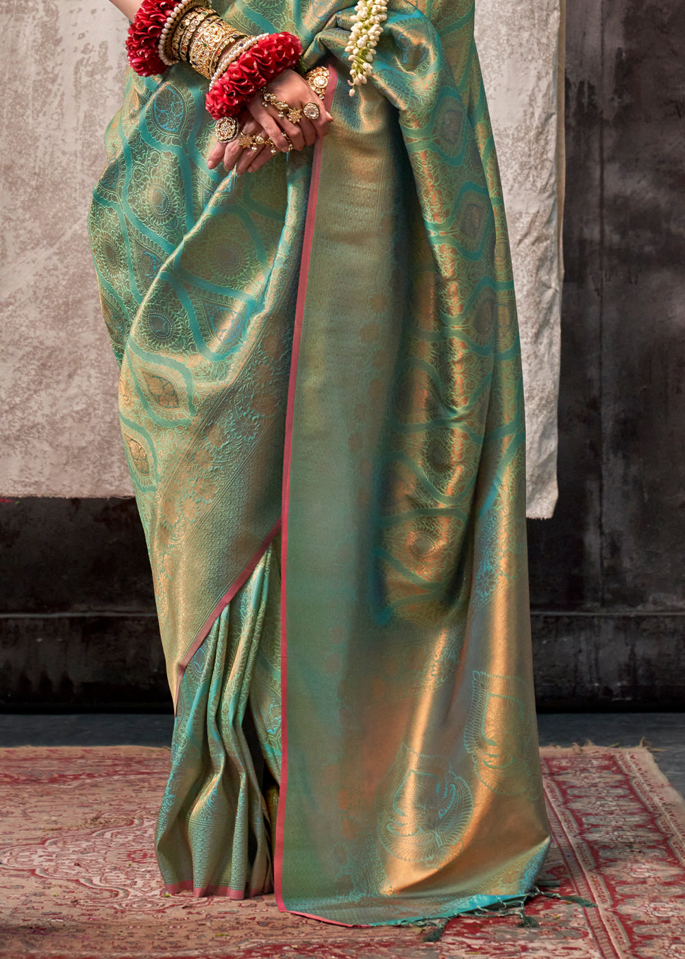 Pastel Green Two Tone Kanjivaram Silk Saree Embellished with Intricate Gold Zari work : Top Pick - qivii