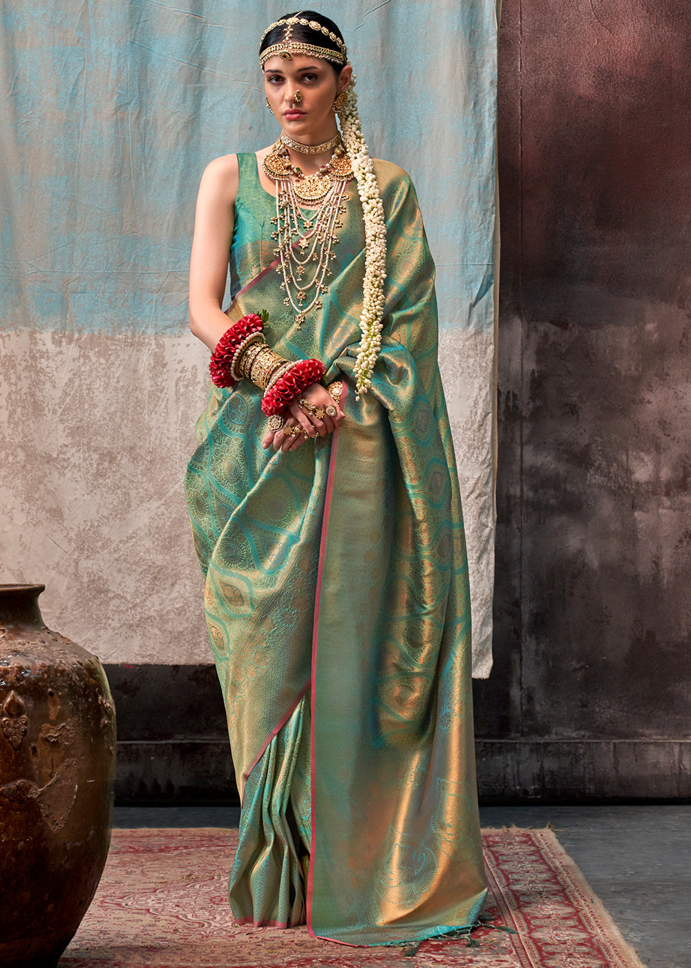 Pastel Green Two Tone Kanjivaram Silk Saree Embellished with Intricate Gold Zari work : Top Pick - qivii