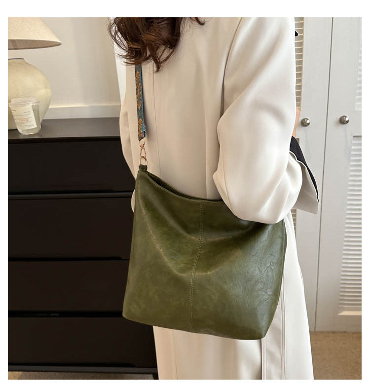 Women's Convertible Crossbody Bucket — Monochrome PU Carryall with Artisan-Embroidered Strap