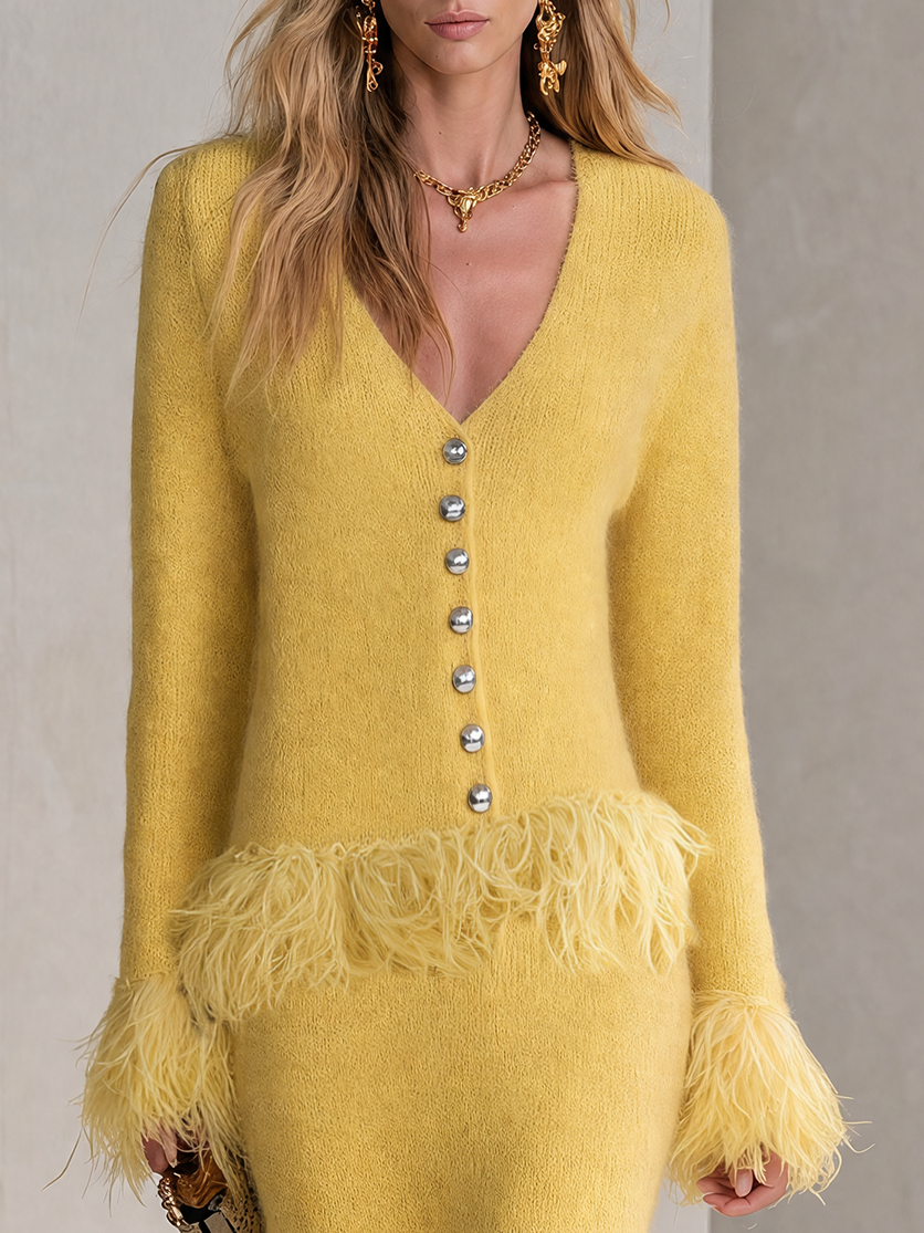 Yellow knitted skirt set with feather fringe details, styled for women, by Oyrosy Clothing in a retro-chic fashion look.