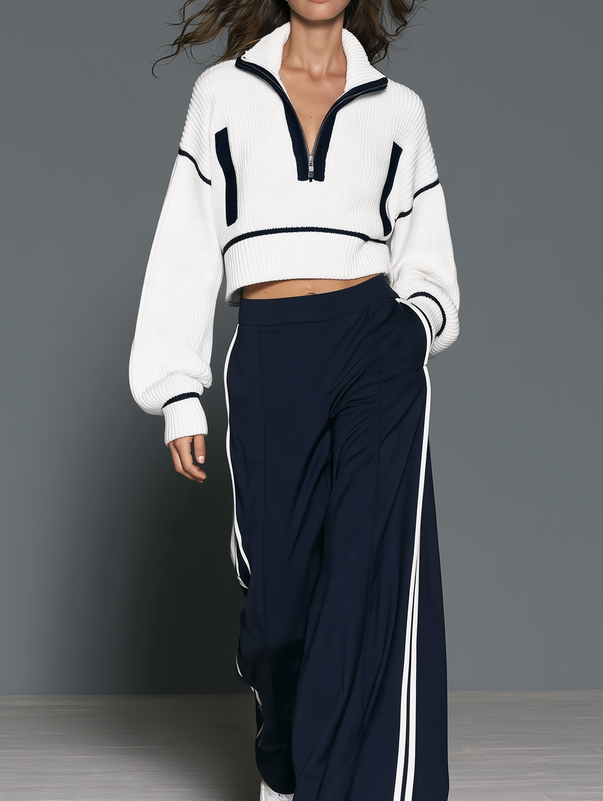 Women's Casual Two-Piece Set Featuring A White Long-Sleeved Knit Top And Dark Blue Sweatpants