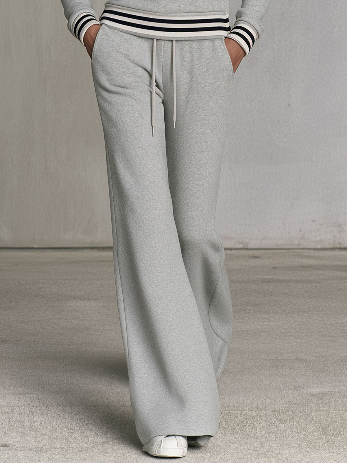 Grey half-zip sporty sweatshirt and wide-leg pants set for women by Oyrosy Clothing, stylish and comfortable casual wear.