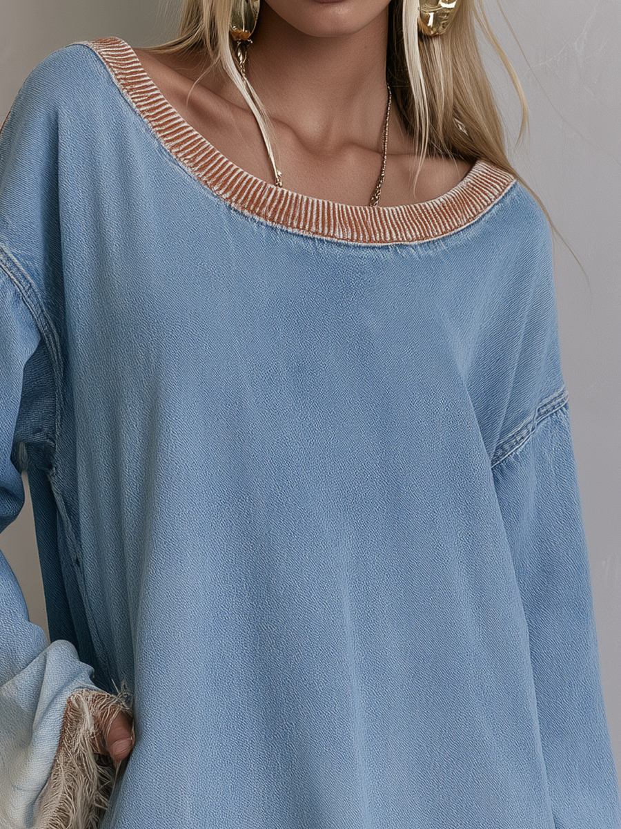 Oversized denim tunic dress by Oyrosy Clothing featuring boho chic fringe hem, dip dye, boat neck, and relaxed fit for women.