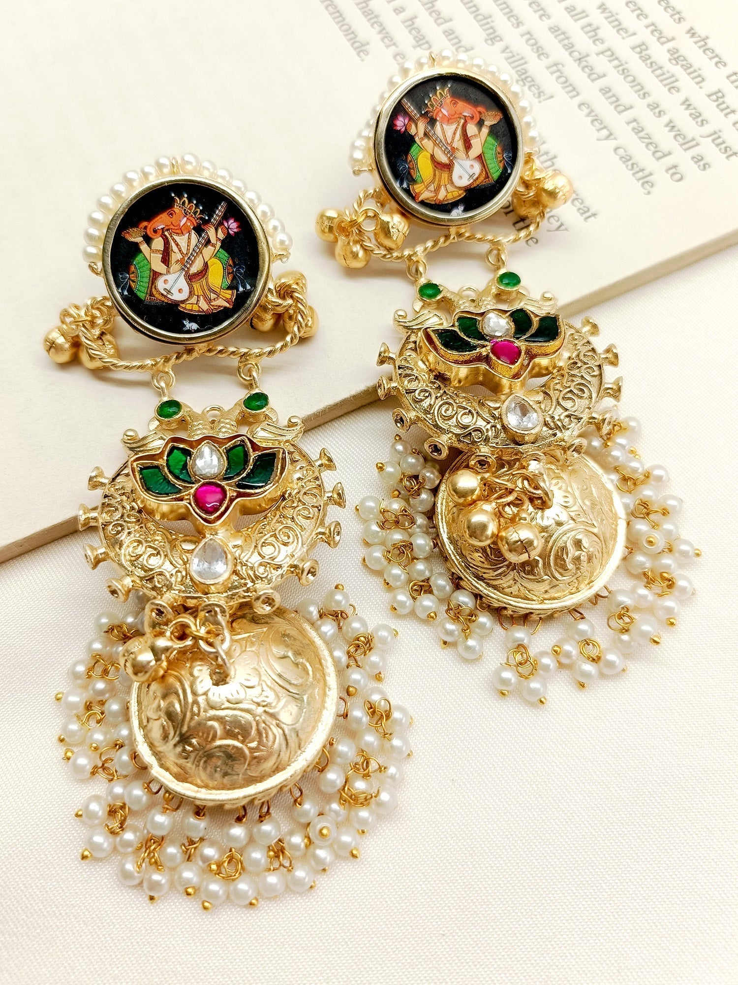 Handcrafted gold and red jhumki earrings by Kanika M & G Boutique
