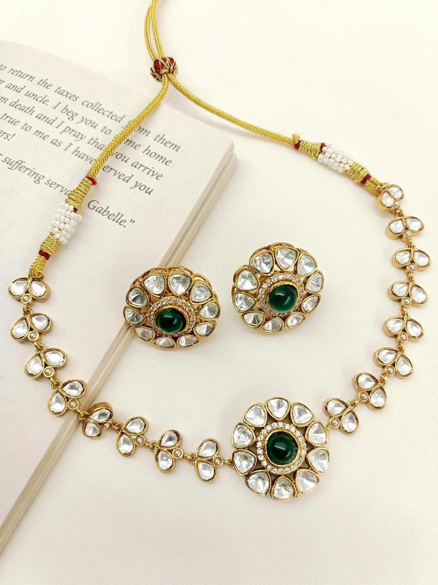 Kayamat Green Kundan Choker Set with Gold Plated Brass Metal and American Diamond Setting