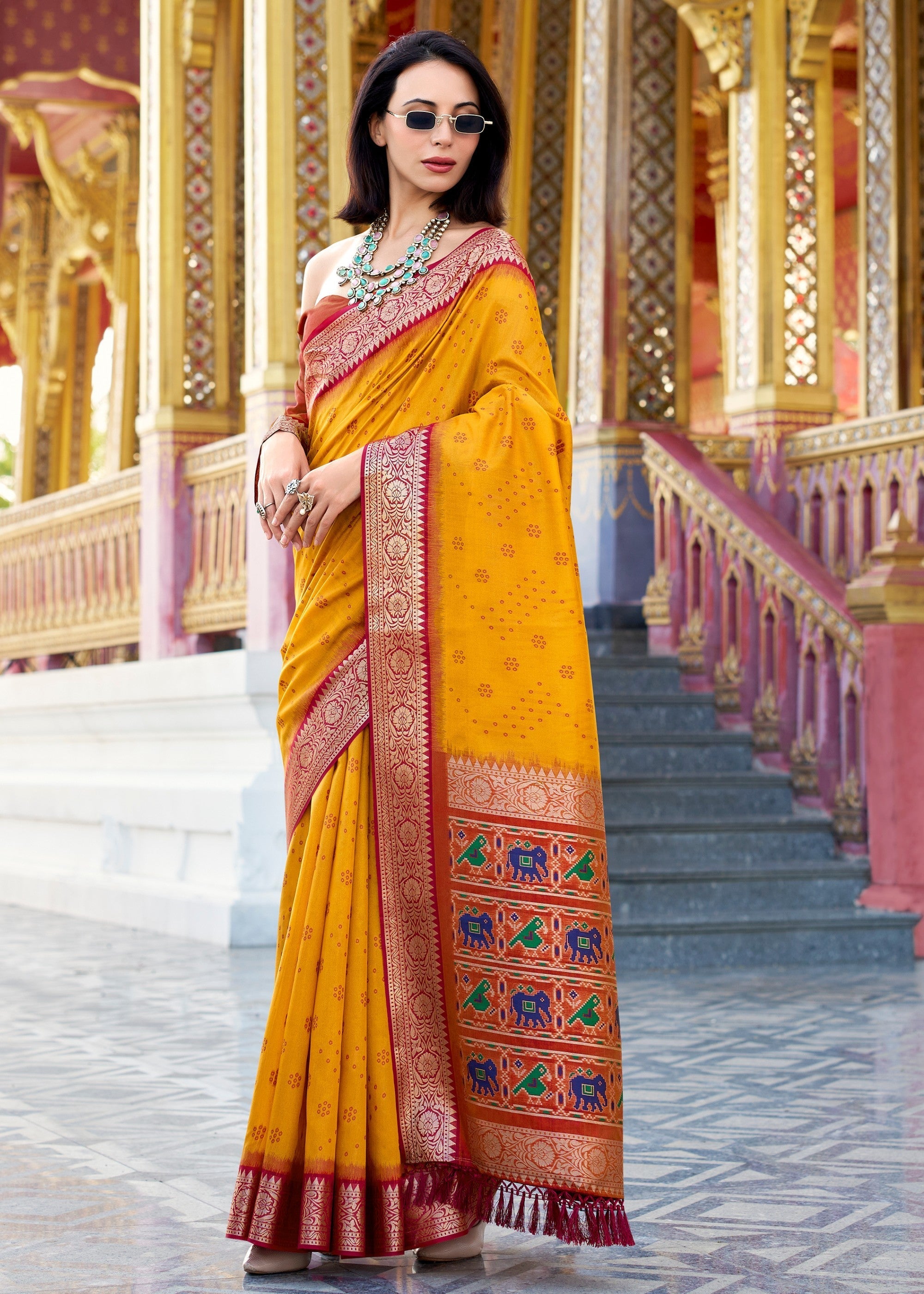 Saffron Yellow Tusser Handloom Silk Saree With Zari Weaving Border & Patola Weaved Pallu - qivii