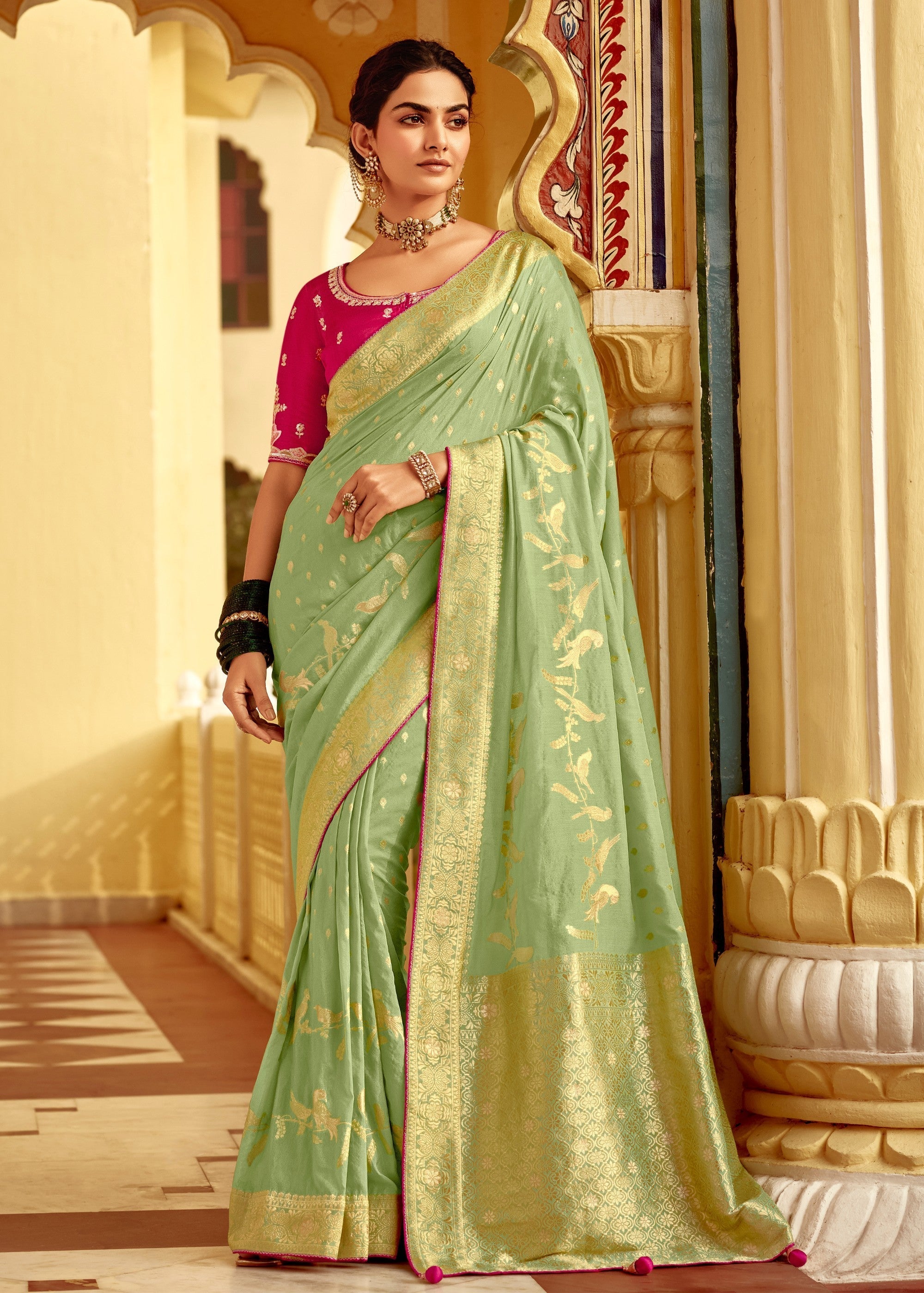 Pistachio Green Dola Silk Saree Embellished With Weaving Work And Heavy Embroidered Blouse - qivii