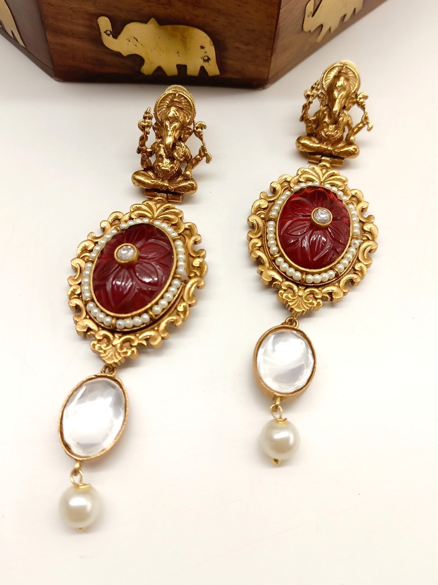 Elegant and intricate Eve Maroon Ganesh Ji Boutique Earrings with beautiful detailing