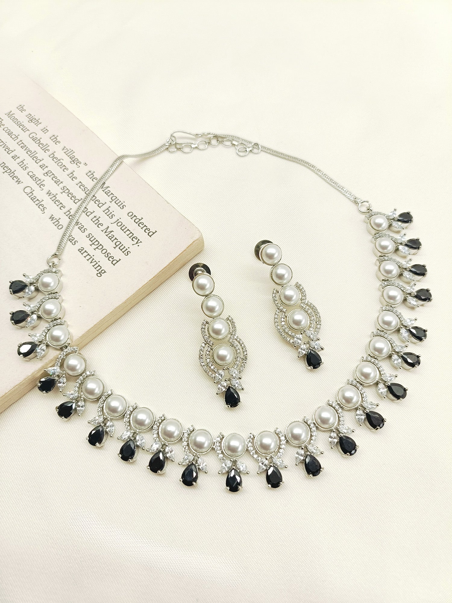 Elegant silver plated brass metal chain necklace with sparkling American Diamonds and pearl detailing