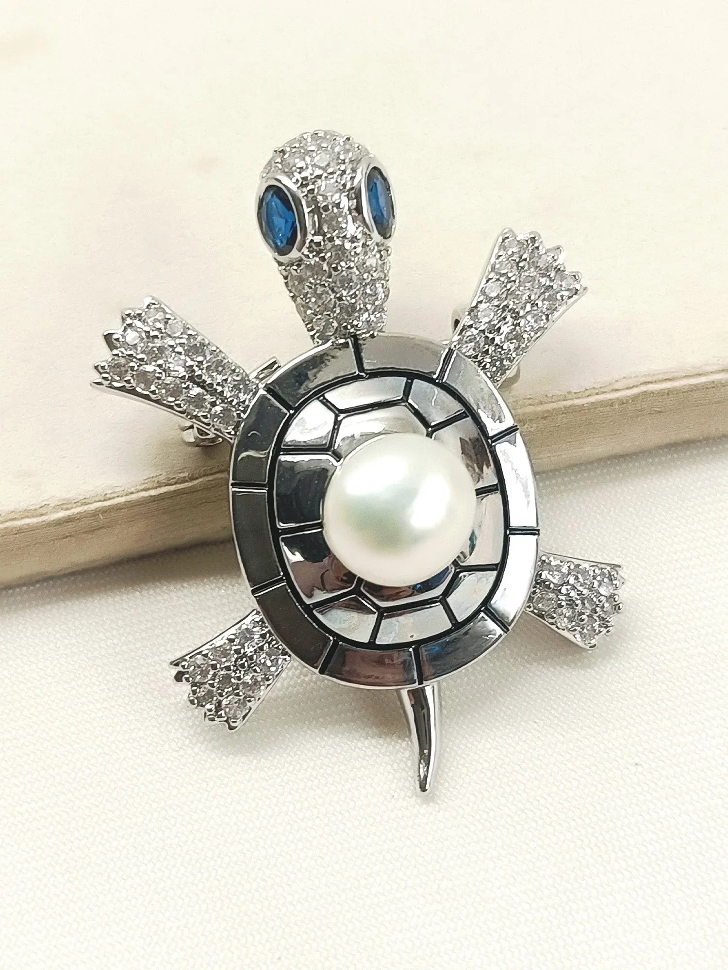 Amla White Pearl Turple Brooch