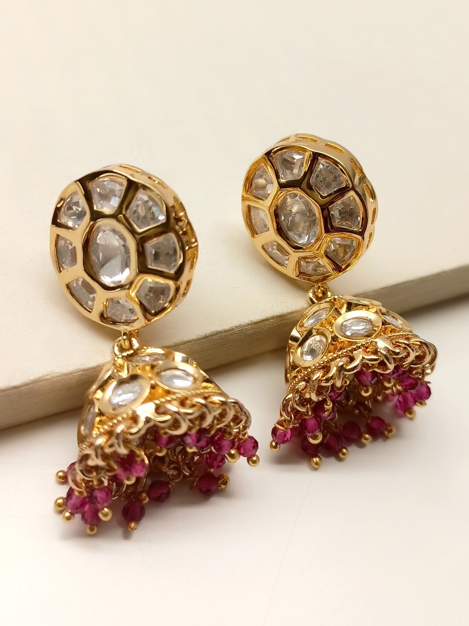 Exquisite Layla Majenta Kundan Jhumki with intricate gold detailing and gemstone accents