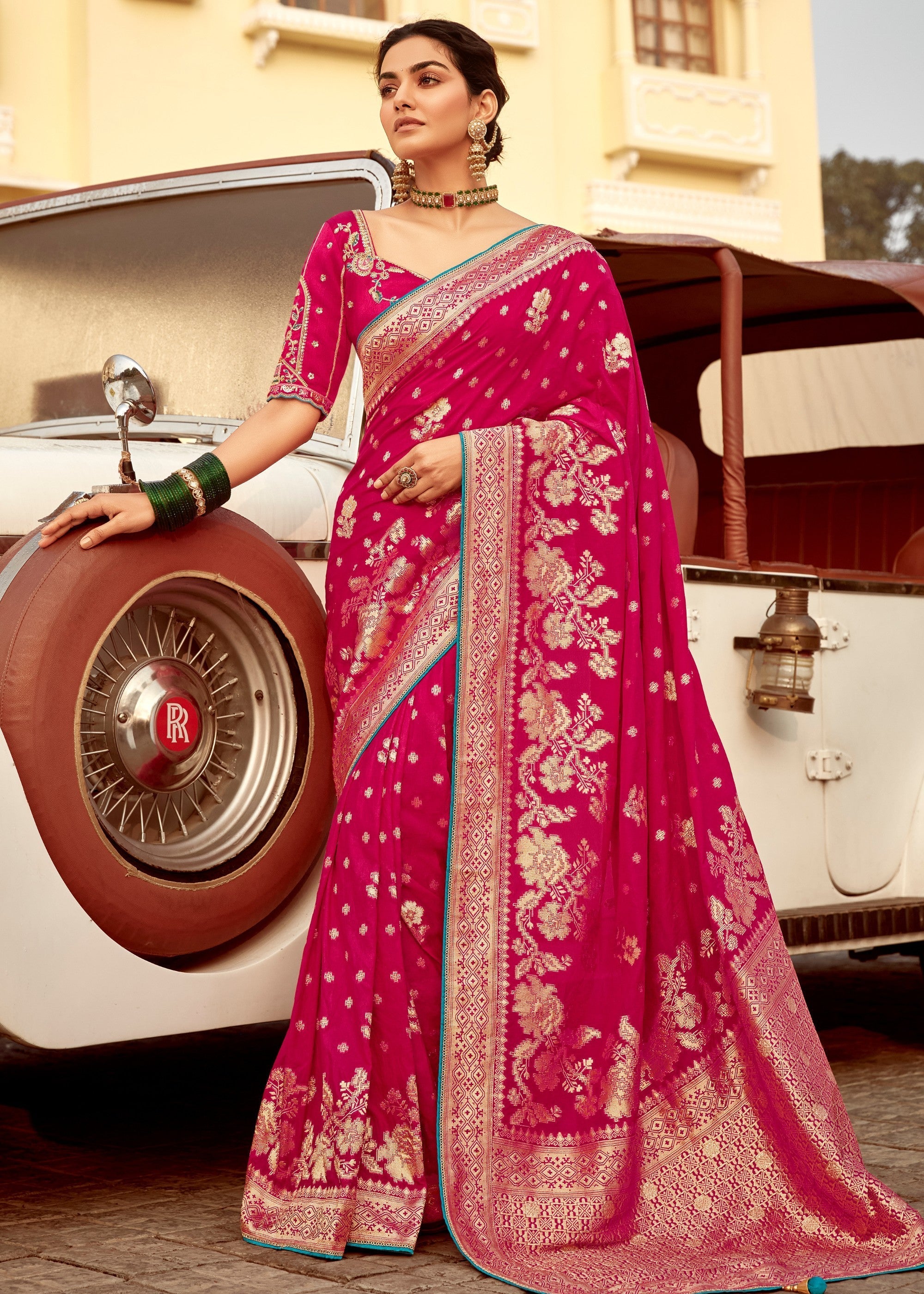 Ruby Pink Dola Silk Saree Embellished With Weaving Work And Heavy Embroidered Blouse - qivii