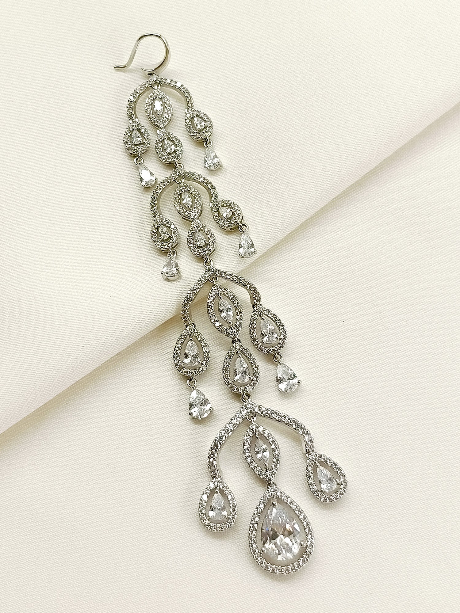 Enakshi White American Diamond Teeka