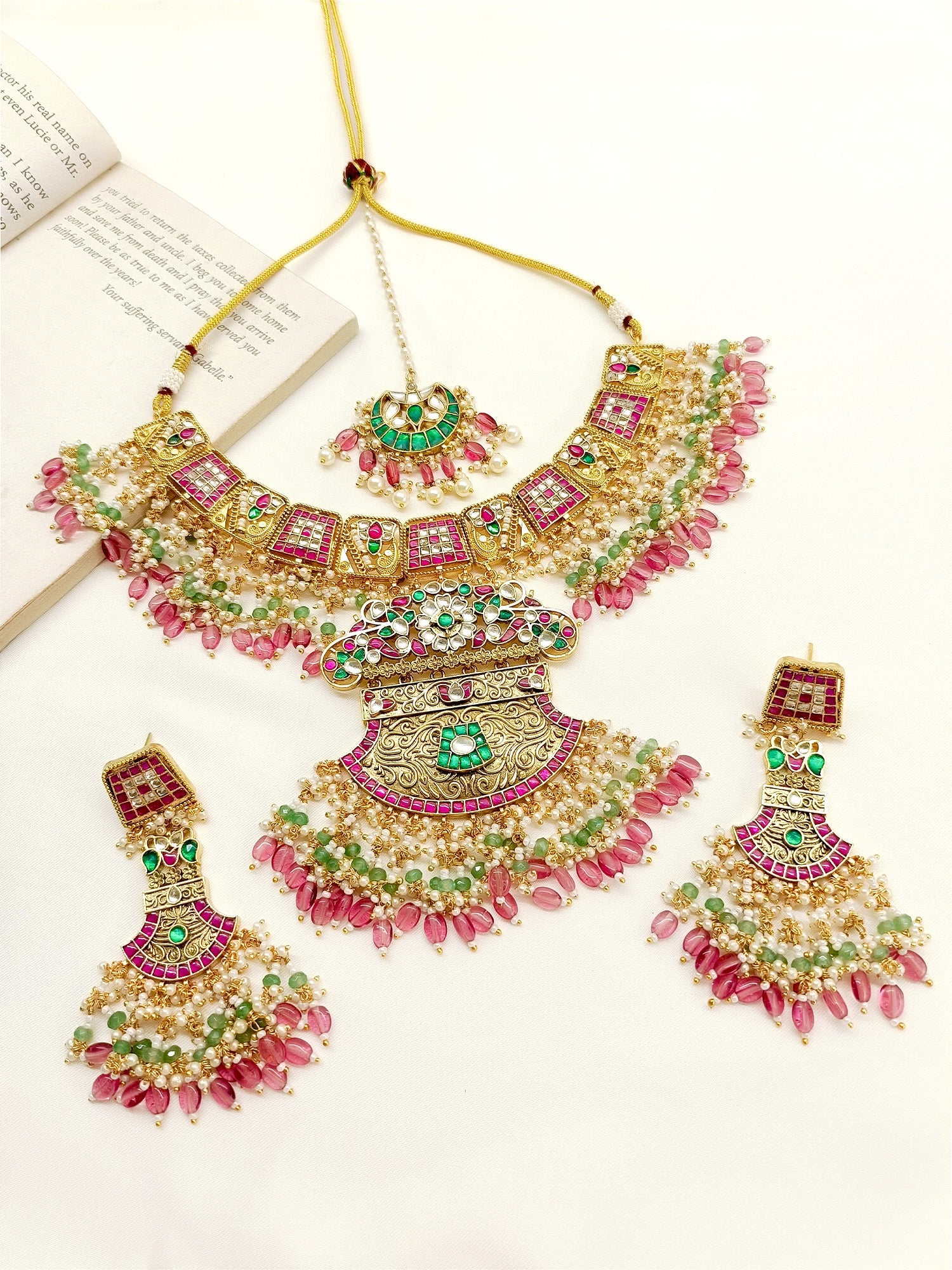 Elegantly designed Kundan Necklace Set crafted from gold-plated brass metal