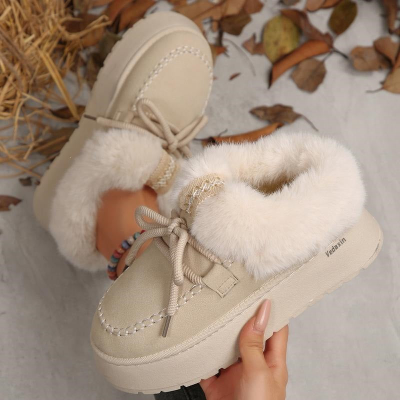 Women's FrostHaven faux fur-lined winter shoes by Bootara, suede lace-up moccasins in US sizes 5.5-10.5, showing cozy interior and stylish design.