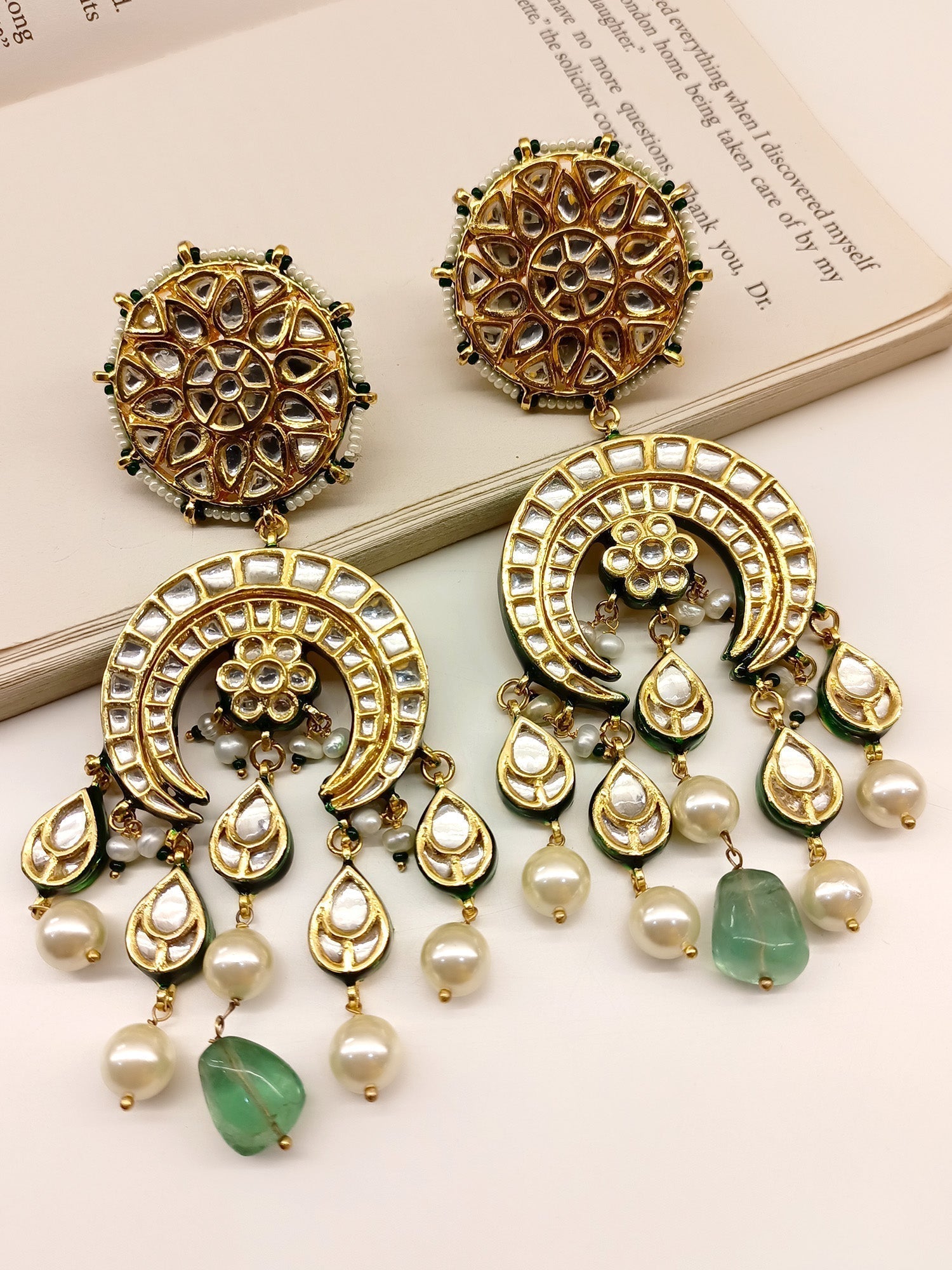 Eva Mint Green Long Kundan Earrings crafted with gold plated brass metal, pearl and bead hanging