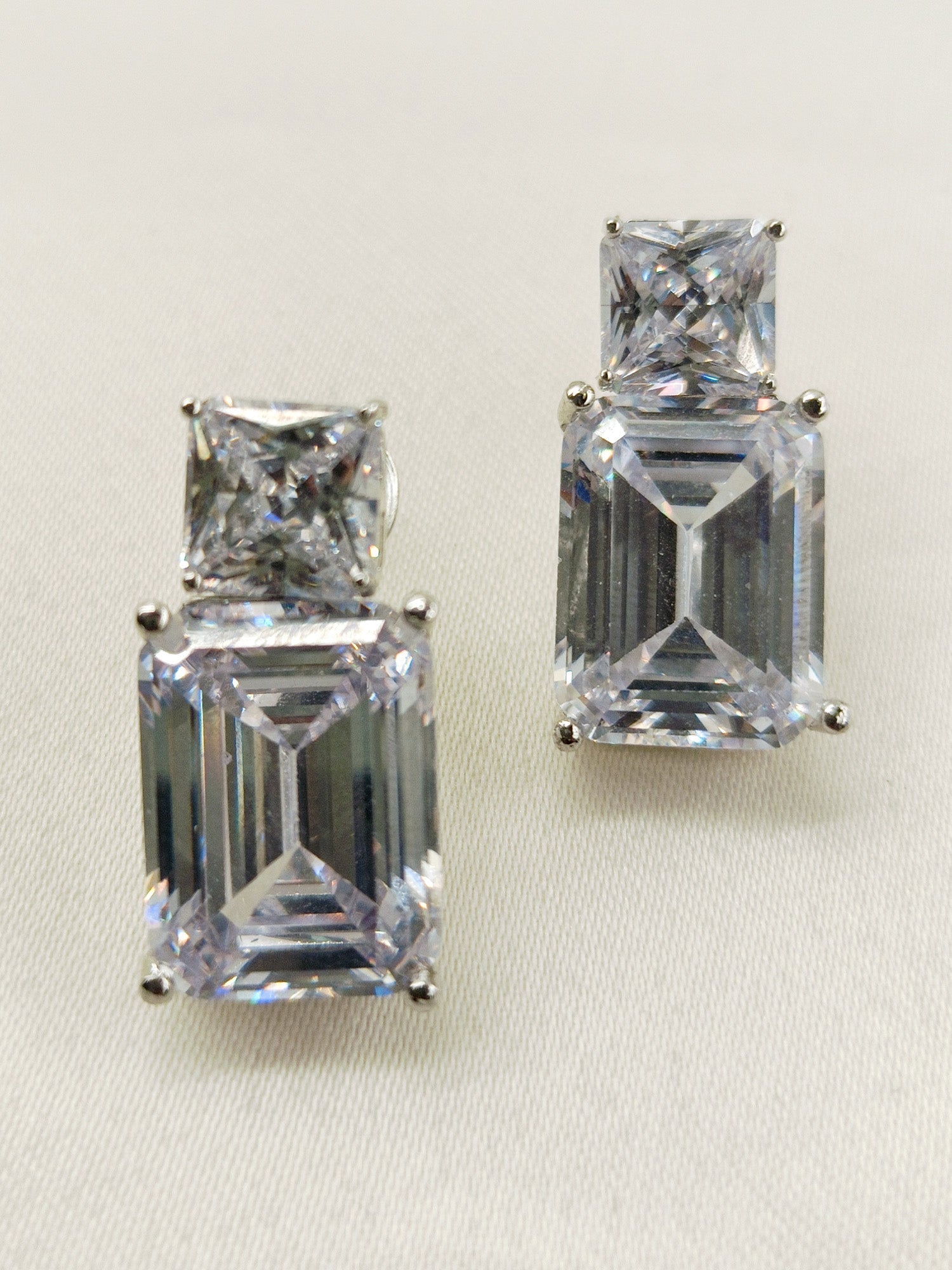 Close-up of elegant Rohini White American Diamond Tops with black polish brass metal and genuine American diamonds, creating a sparkling and sophisticated look