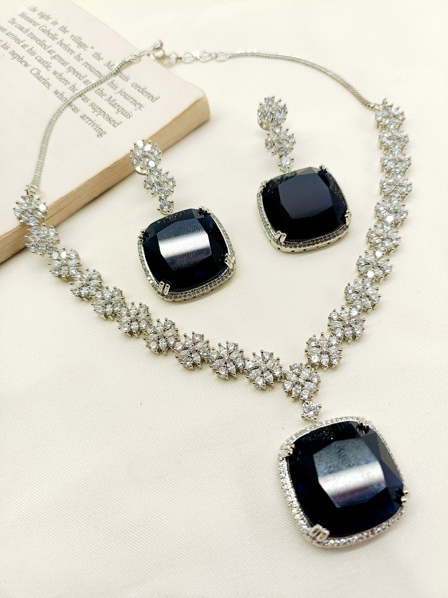 Close up of Jigya Navy Blue American Diamond Necklace Set with elegant American Diamond stones and silver plated brass metal