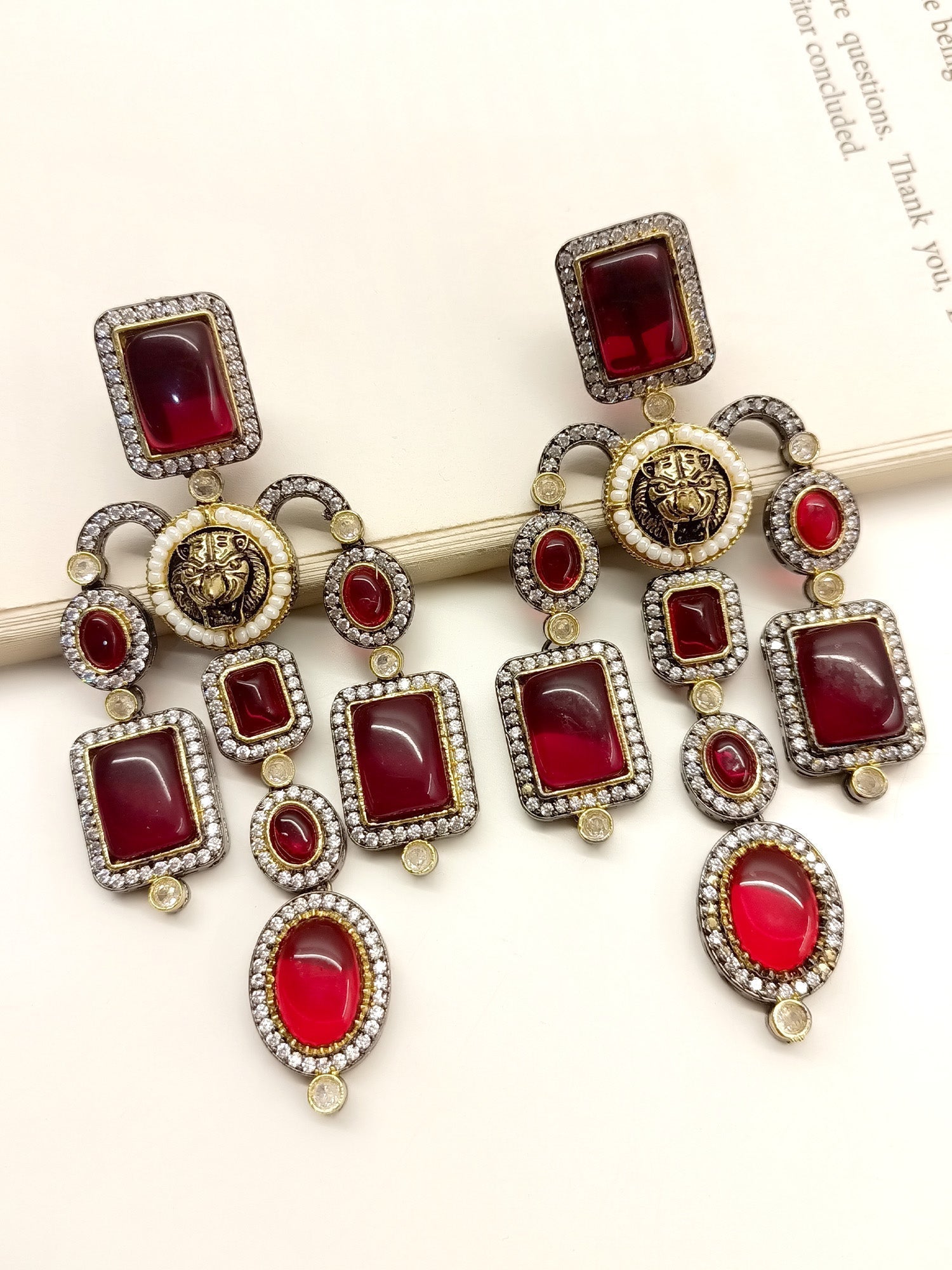 Charlotte Maroon Long Victorian Earrings crafted from rhodium plated brass metal with lion motifs