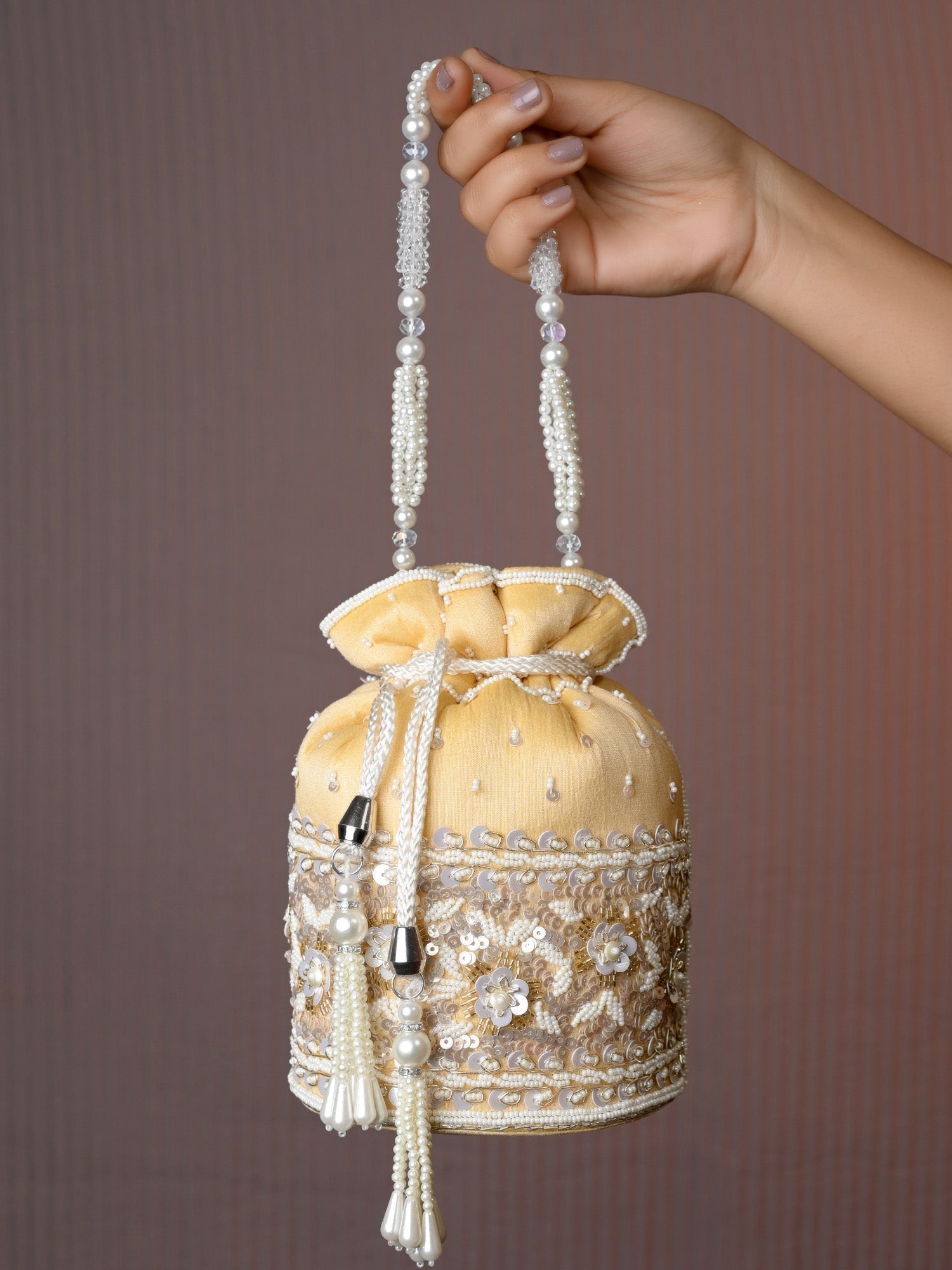Aamani Beige Potli Bag - qivii