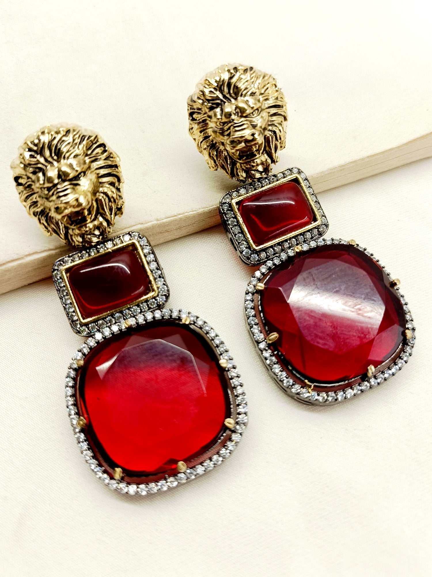 Amaris Maroon Victorian Earrings with traditional lion motifs and black polish brass metal
