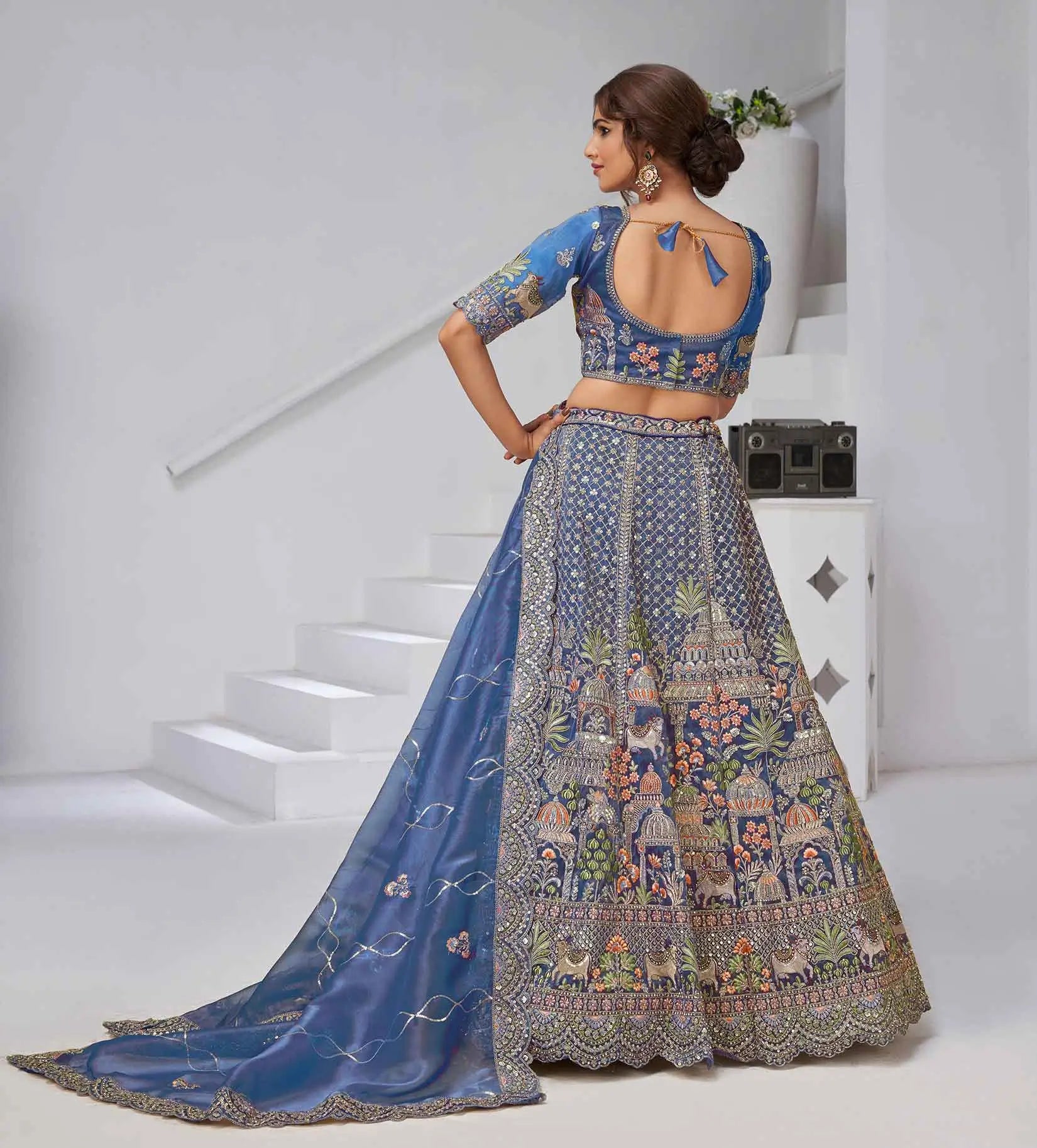 Dusty Blue Bridal Lehenga With Temple & Cow Motifs - qivii