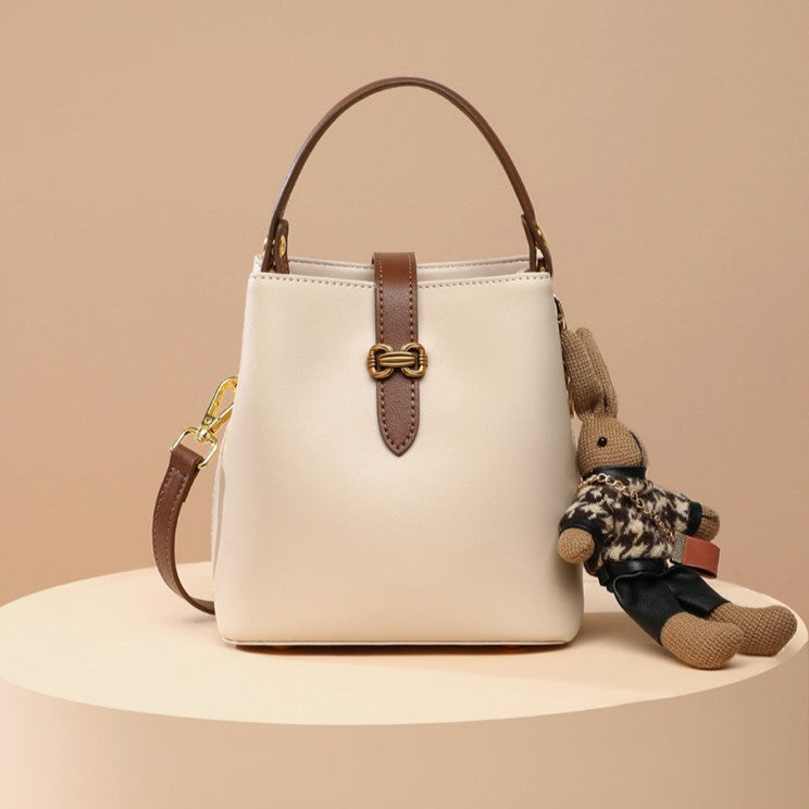 Women’s Bunny Charm Bucket Satchel — Cowhide Leather Convertible with Sculptural Clasp & Signature Whimsy