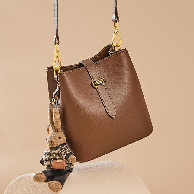 Women’s Bunny Charm Bucket Satchel — Cowhide Leather Convertible with Sculptural Clasp & Signature Whimsy