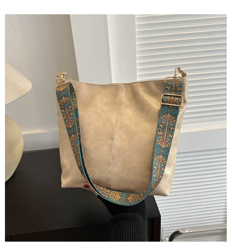 Women's Convertible Crossbody Bucket — Monochrome PU Carryall with Artisan-Embroidered Strap