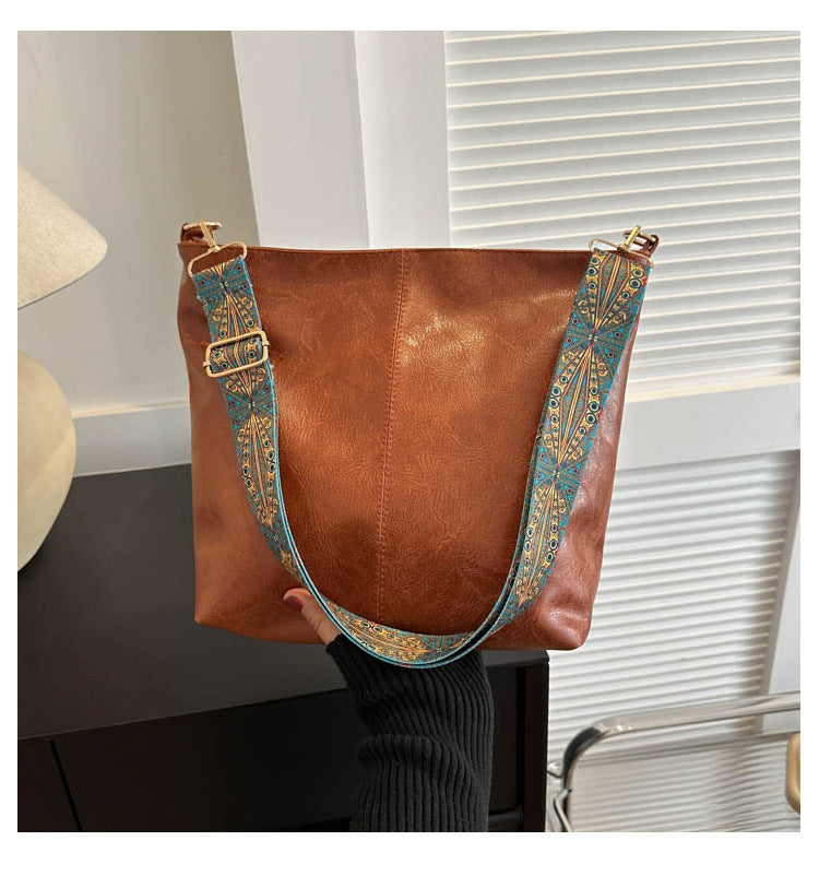 Women's Convertible Crossbody Bucket — Monochrome PU Carryall with Artisan-Embroidered Strap