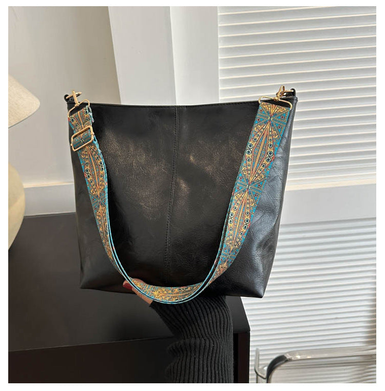 Women's Convertible Crossbody Bucket — Monochrome PU Carryall with Artisan-Embroidered Strap