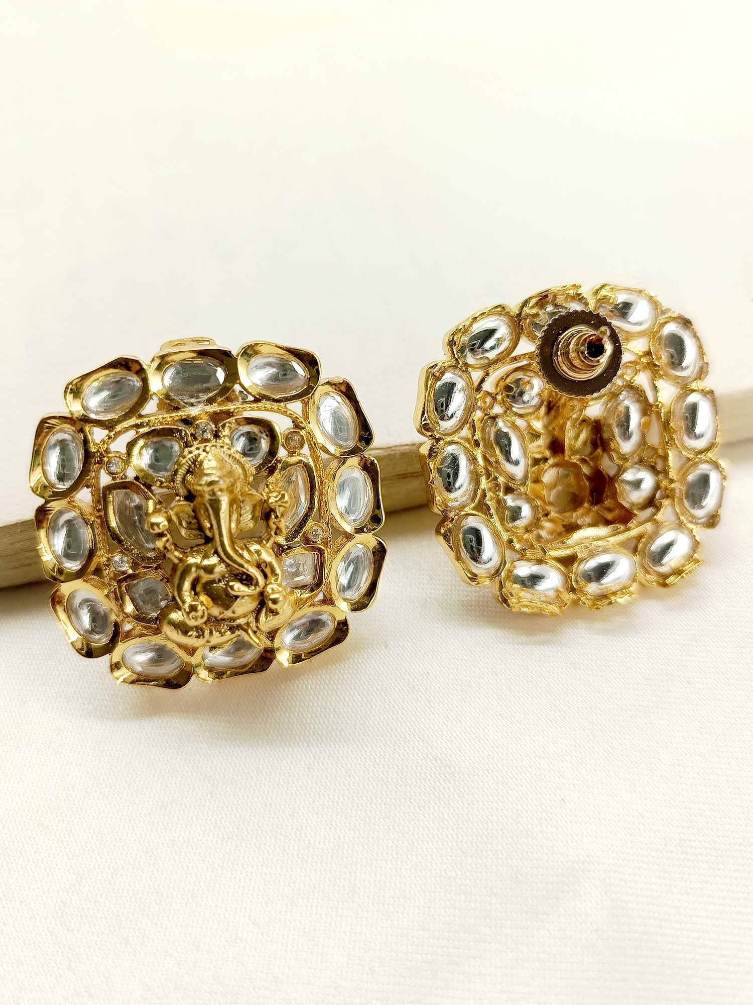 Beautiful Kamari White Kundan Tops featuring intricate Ganesh Ji design