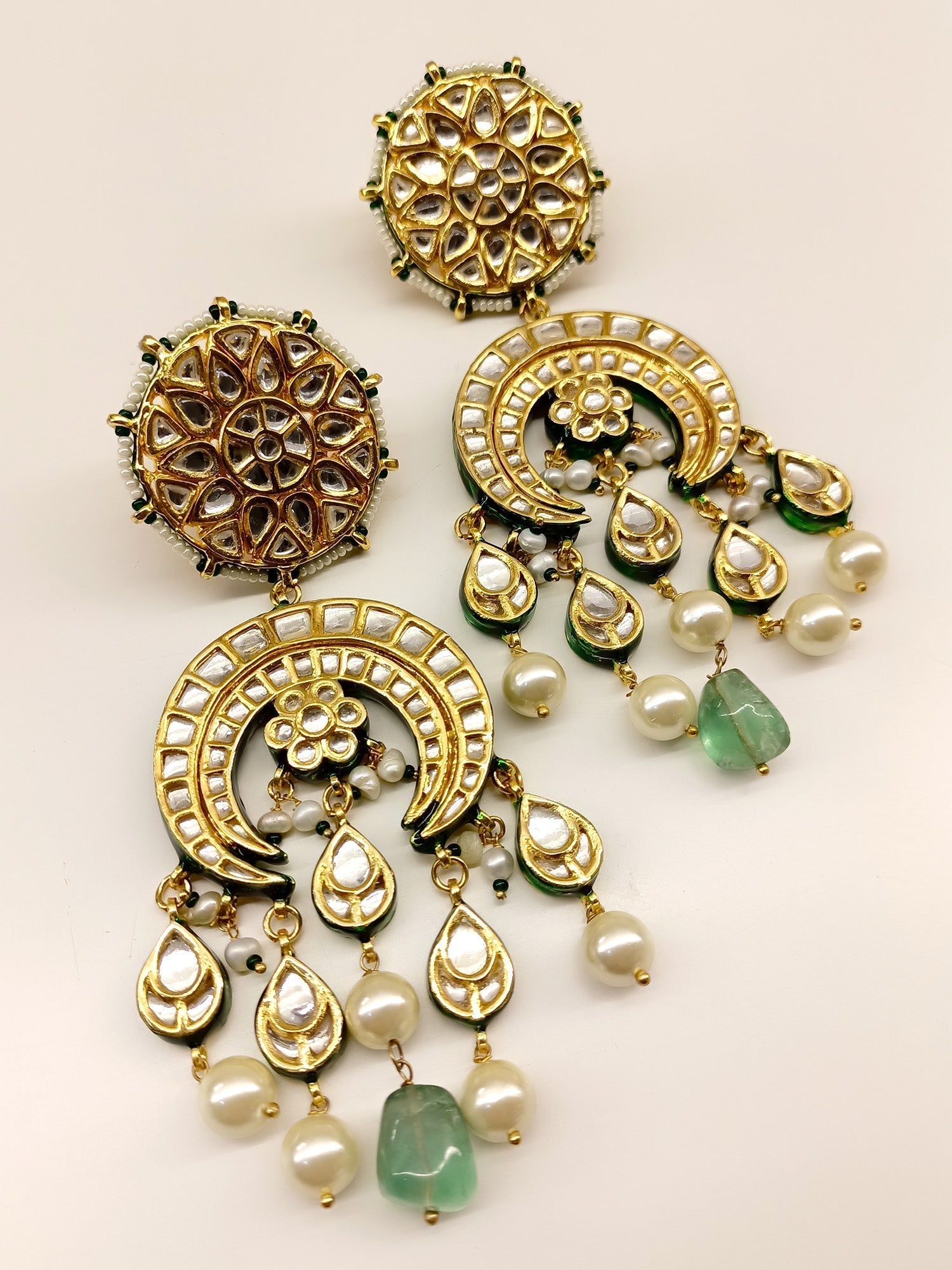 Stunning Kundan Earrings with gold plated brass metal and pearl accents, perfect for traditional occasions