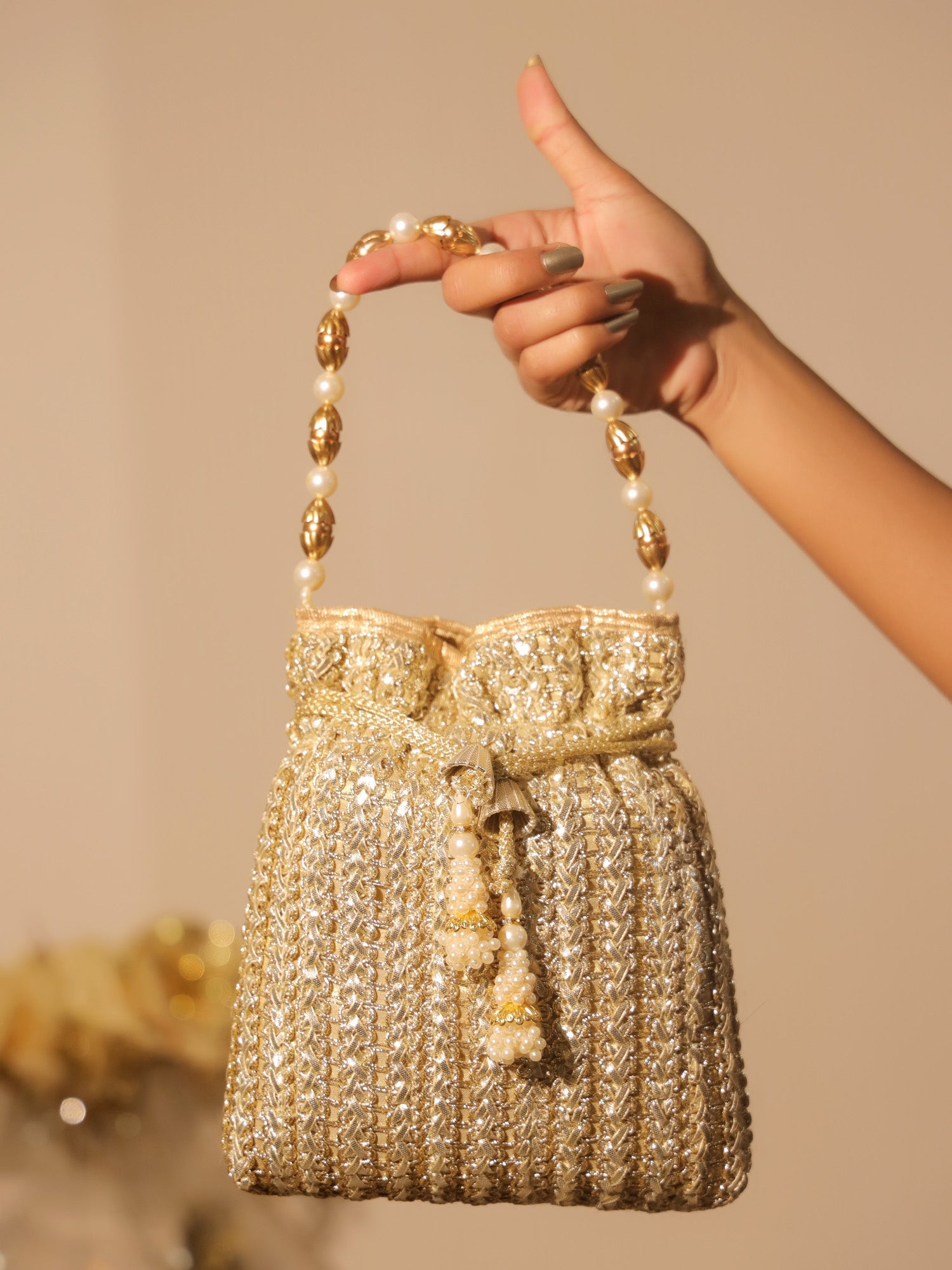 Naysa Golden Potli Bag - qivii