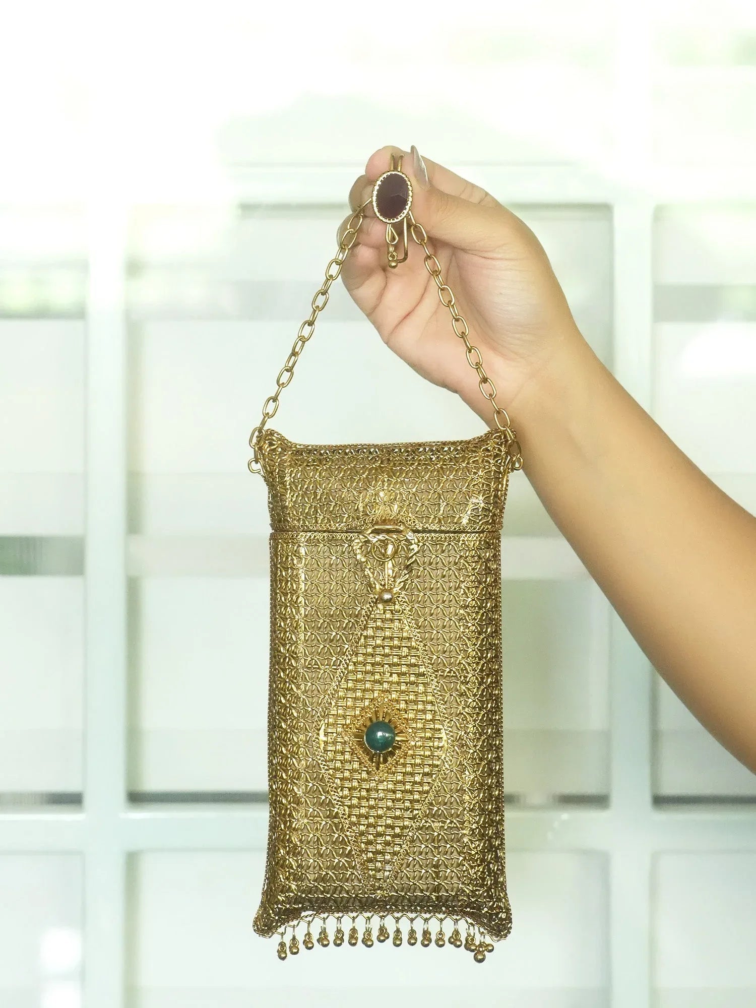 Saanvika Golden Mobile Pouch