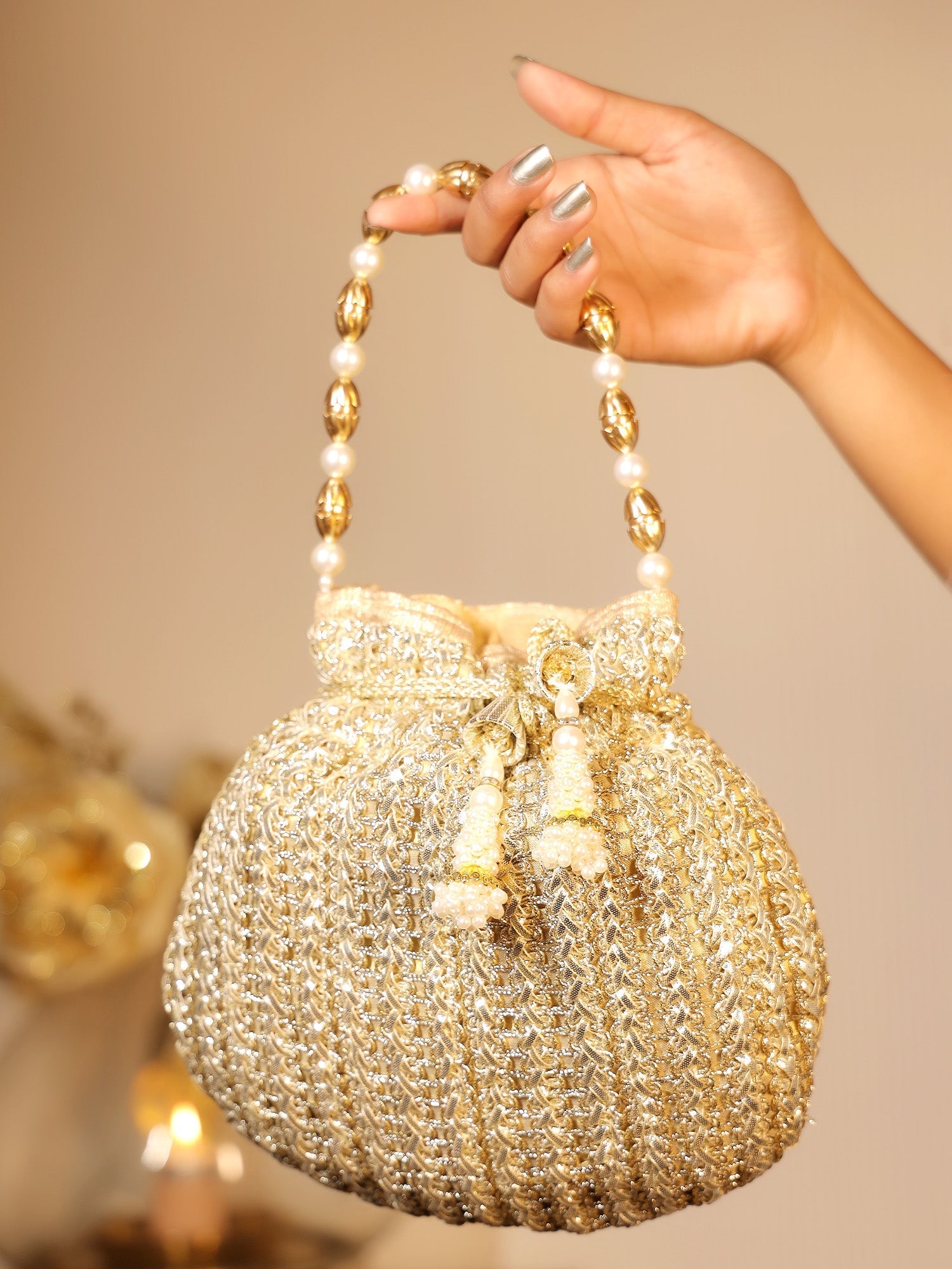 Avinashi Golden Potli Bag - qivii